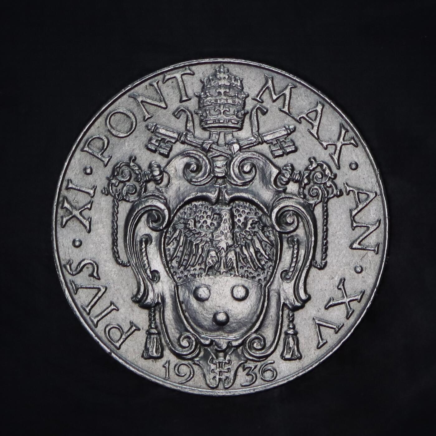 观钱 近现代机制币拍卖No.005（全场顺丰包邮，不区分偏远地区）  梵蒂冈 1936 年庇护十一世 大天使圣米迦勒 50 分镍币，最美镍币，大天使圣米迦勒（San Michele Arcangelo），身披羽翼，手持利剑与权杖，姿态英武。 由意大利著名雕刻师奥雷利奥・米斯特鲁齐（Aurelio Mistruzzi）设计，古典主义雕刻风格精湛，宗教题材富有感染力。