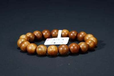 上海都达杂项专场90【全场包邮】  天然黄油格沉香1.0圆珠手串 附鉴定证书69-361