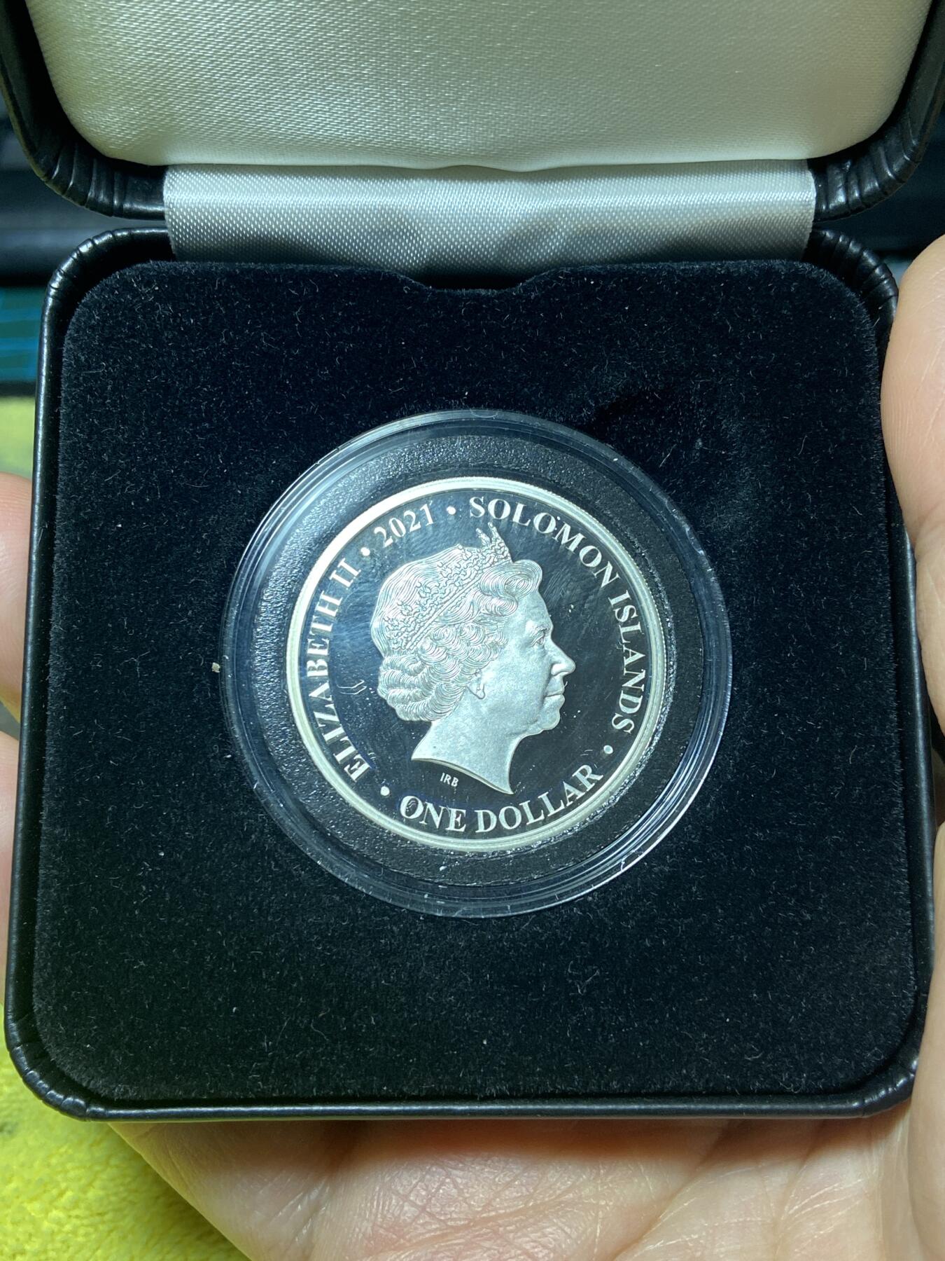 2026年第三十七场(总第二百零六场）德紧纸币特拍场(佣金3%，最低1元) Proof精制币–所罗门群岛2021年1元银币(伊丽莎白二世女王95岁寿辰纪念银币。999纯银，局部镀金（Partially Gilded） 15.5克（½盎司），直径33.0毫米原盒带证书)