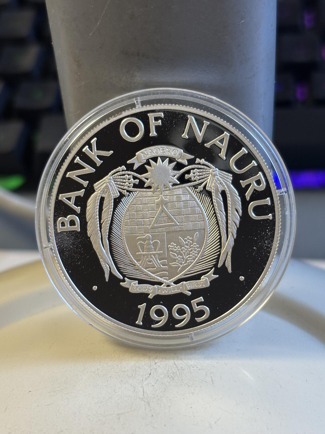 第194期拍卖 瑙鲁1995发行96年奥运会举重1盎司纪念银币，925银