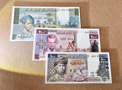 【礼羽收藏】🌏世界钱币拍卖129期 - 【一组3张 同冠全同千位倒置小号】毛里塔尼亚 1977年100-1000乌吉亚 未发行 全新UNC