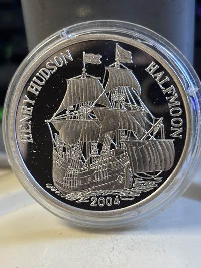 第194期拍卖 - 朝鲜2004年探险家亨利哈德逊7WON精制银币 20克纯银，有氧化，塑料盒有裂痕