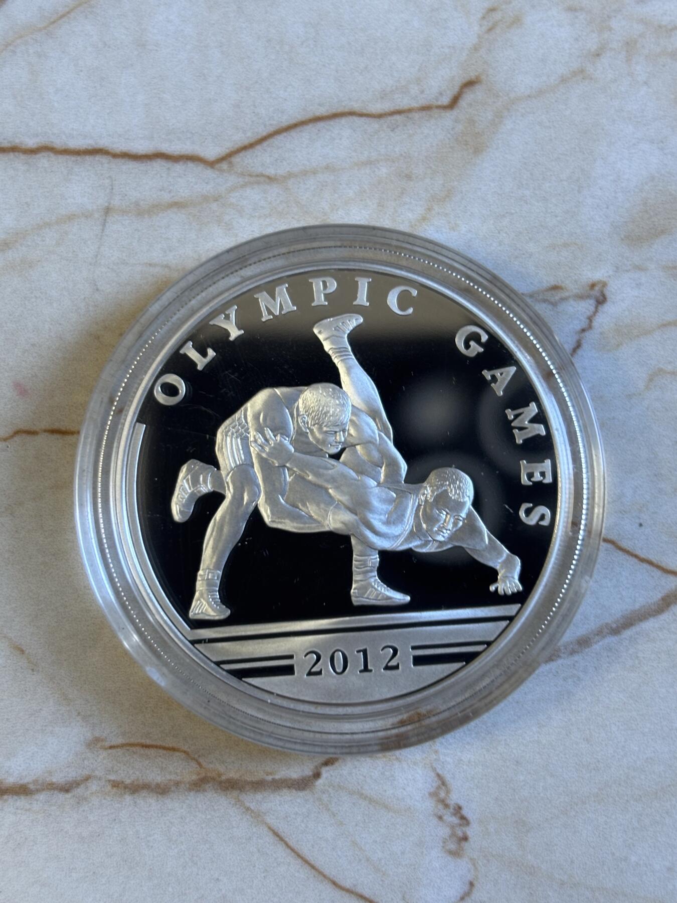 第194期拍卖 哈萨克斯坦2010年发行纪念2012年奥运摔跤精制银币带证书，925银，发行12000枚