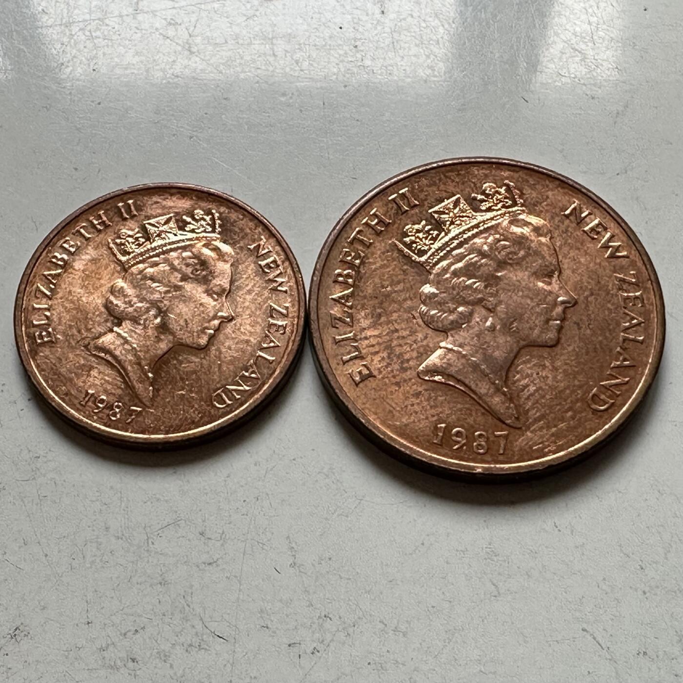 🌹外币初藏🌹🐯2026年第32场   每周二四六晚8️⃣点 接代拍 新西兰1987年中年版1-2分一对 带光好品 c