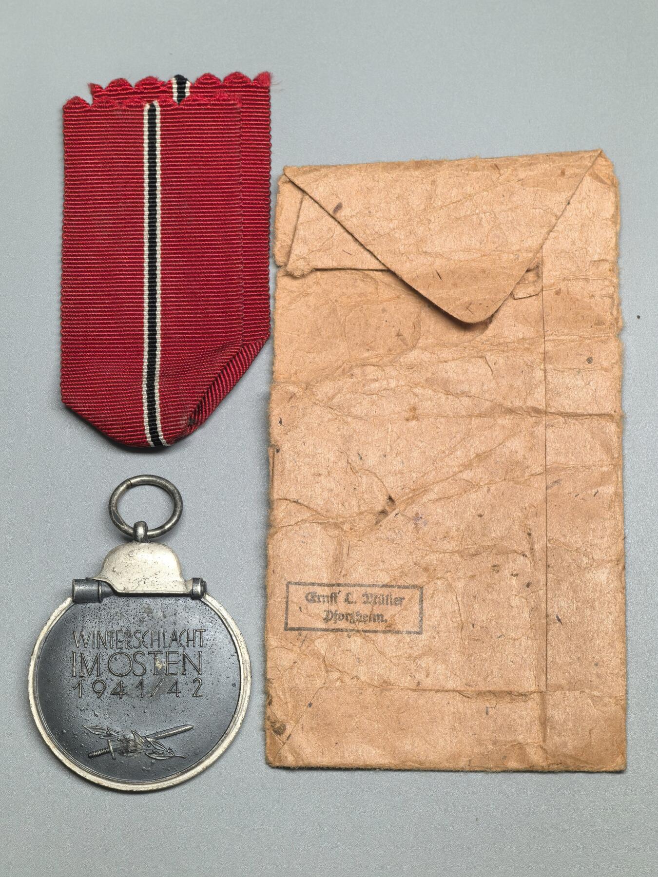 小驴勋章奖章收藏3月21日周六晚六点拍卖（珍爱和平，收藏战争，铭记历史，勿忘国耻，忠党爱国。有偿代拍，送拍规则在简介最后，参拍须阅读规则后再参拍，关系到运费包装发货时效真假辨别等关键信息，拍卖时不再发原图，看大图店主微信码在拍卖店铺介绍里） 德WWII东线冬季作战奖章带原纸袋