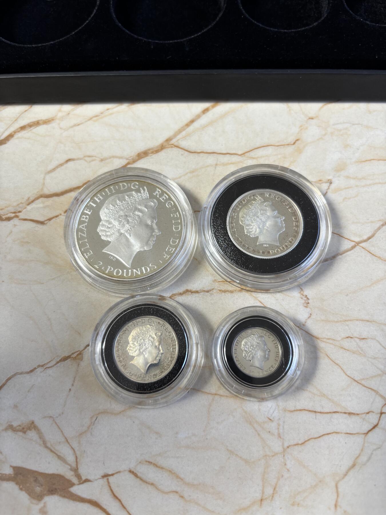 第195期拍卖 英国2011年不列颠女神系列精制纪念银币4枚全套，32.45克/16.22克/8.11克/3.24克，有氧化，958银