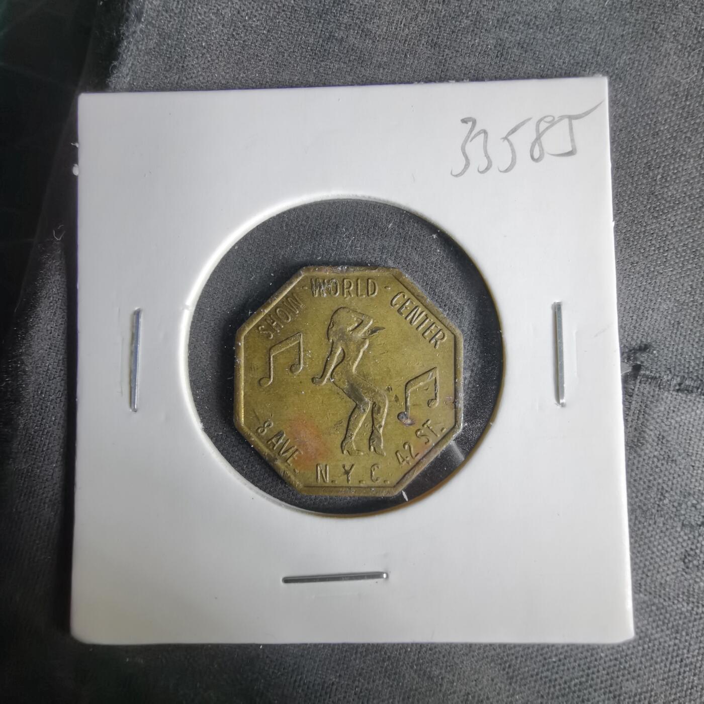 沼泽如烟--第1033场 纽约Show World Center脱衣舞俱乐部八角形代币