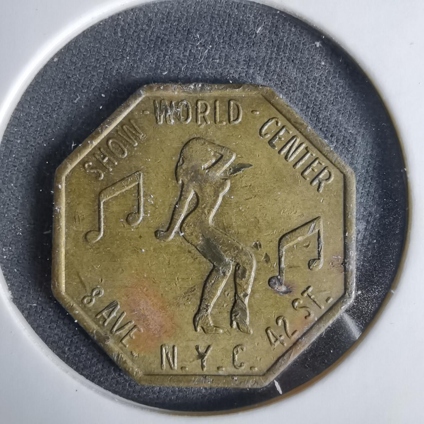 沼泽如烟--第1033场 纽约Show World Center脱衣舞俱乐部八角形代币