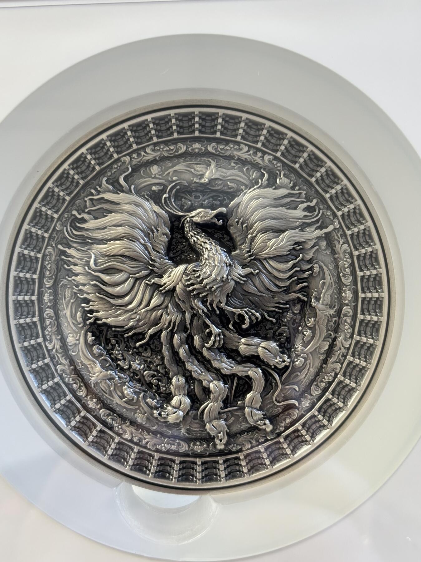 第195期拍卖 乍得2022年曼荼罗艺术系列凤凰2盎司高浮雕银铜纪念币NGC-MS70首，金属:999银+铜，重量:2盎司银+8盎司，发行：500枚