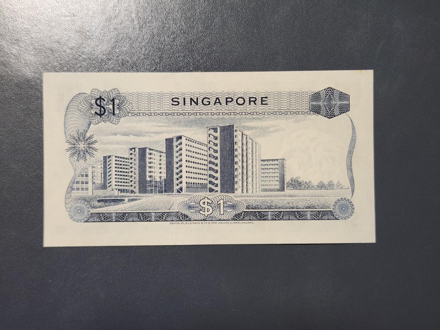 3月21号晚上8点 外国纸币自动截拍第42场 新加坡1967年 花版 无章 1元 林金山签名 首版 新品