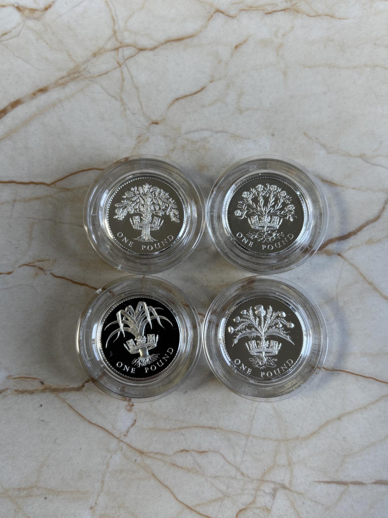 第195期拍卖 英国1984-1987年1英镑精制加厚纪念银币4枚全套，925银，19克*4，发行10000枚