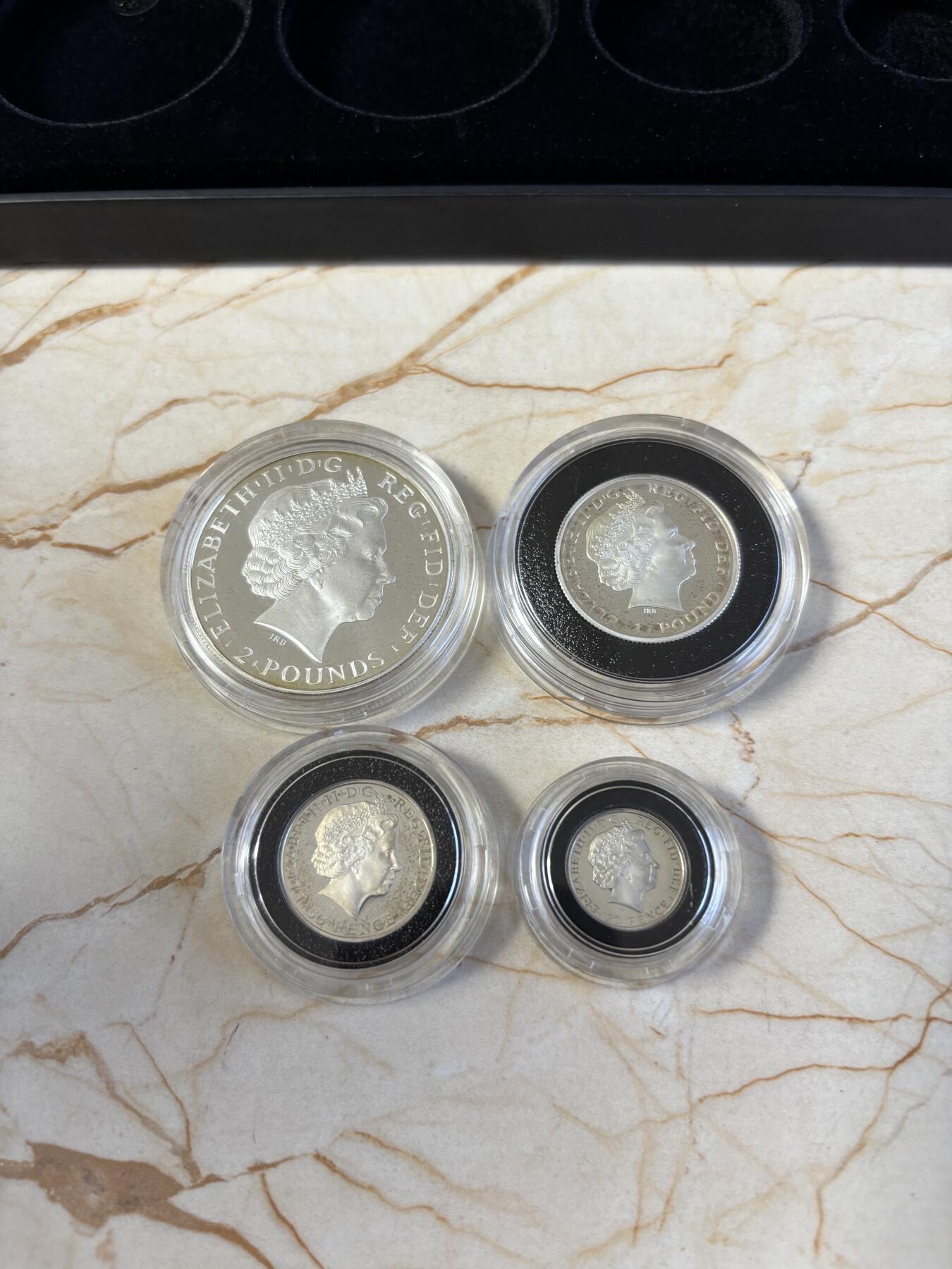 第195期拍卖 英国2011年不列颠女神系列精制纪念银币4枚全套，32.45克/16.22克/8.11克/3.24克，有氧化，958银