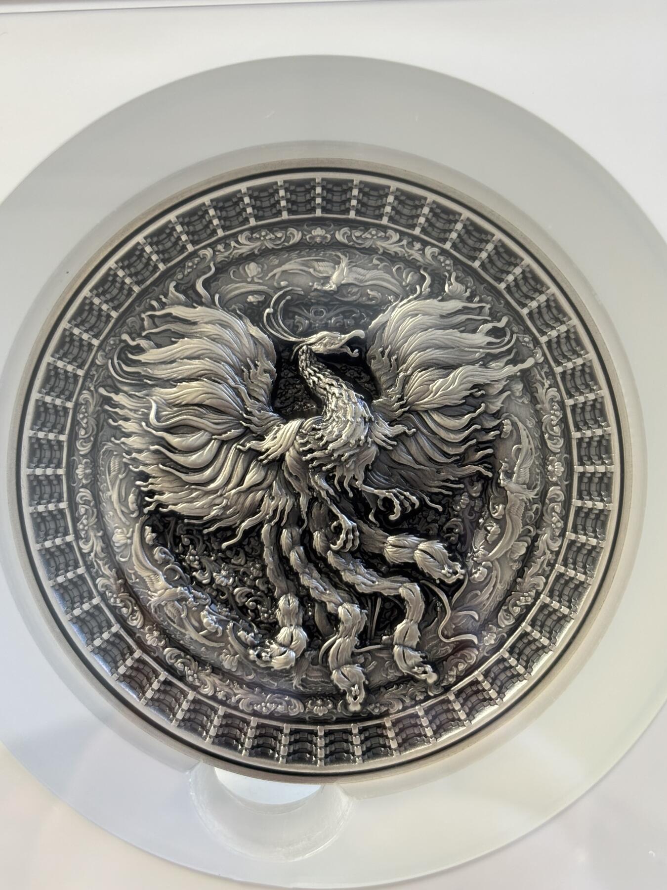 第195期拍卖 乍得2022年曼荼罗艺术系列凤凰2盎司高浮雕银铜纪念币NGC-MS70首，金属:999银+铜，重量:2盎司银+8盎司，发行：500枚