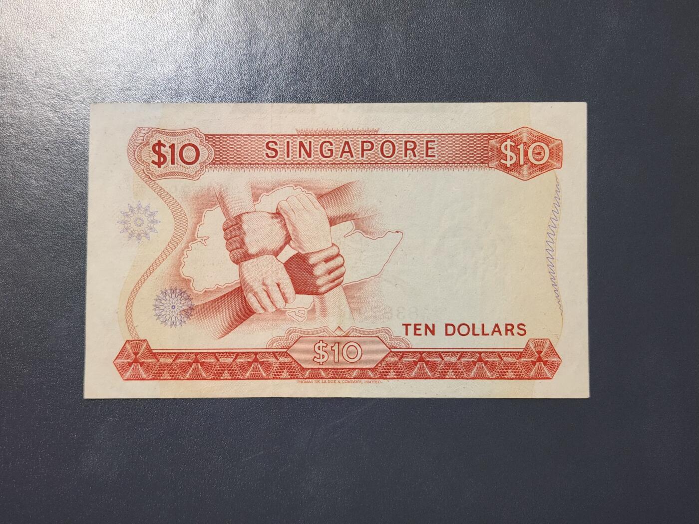 3月21号晚上8点 外国纸币自动截拍第42场 新加坡 1967年10元 花版 首版 林金山签名，原票极美品