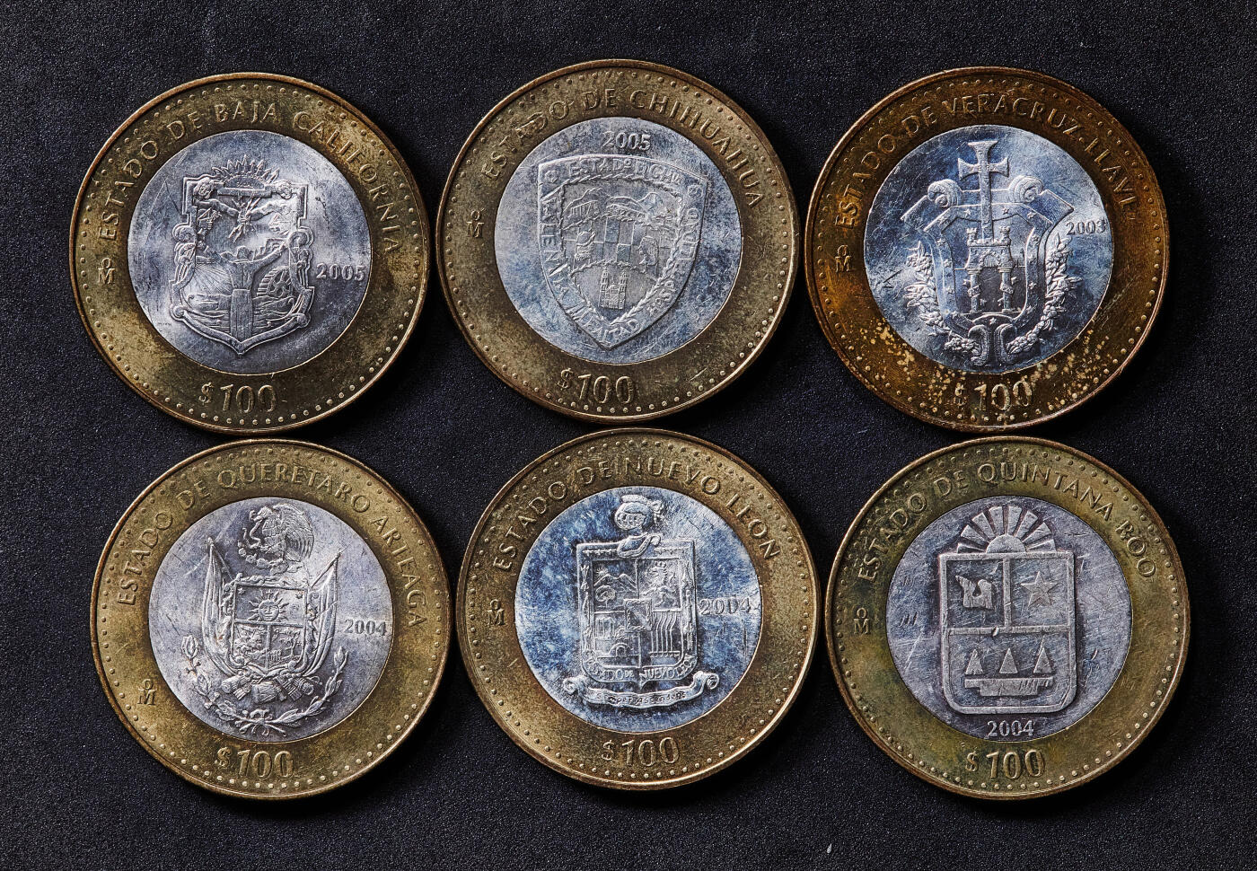 【俄甄集藏】2026年(050)04-01星期三 晚 19:30 全场包邮 墨西哥2003-2005年联邦州100比索双色纪念大银币6枚一组，外圈为铜，中心为925银，单枚重约33.9克，分别为下加利福尼亚州、奇瓦瓦州、韦拉克鲁斯州、克雷塔罗州、新莱昂州、金塔纳罗奥州
