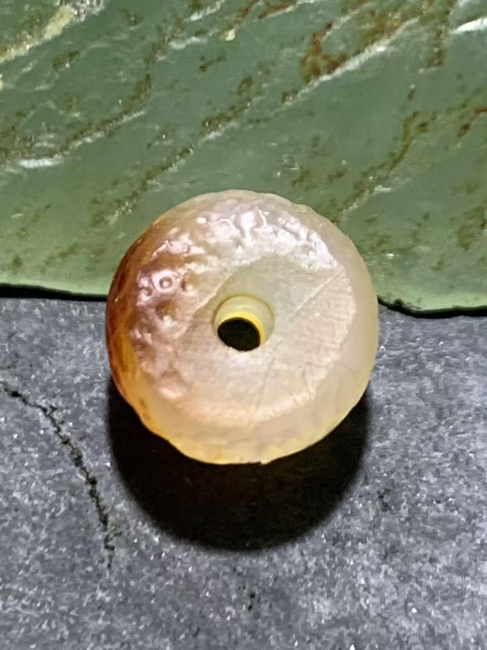 高玉化风化纹糖果玛瑙桶珠一颗，，