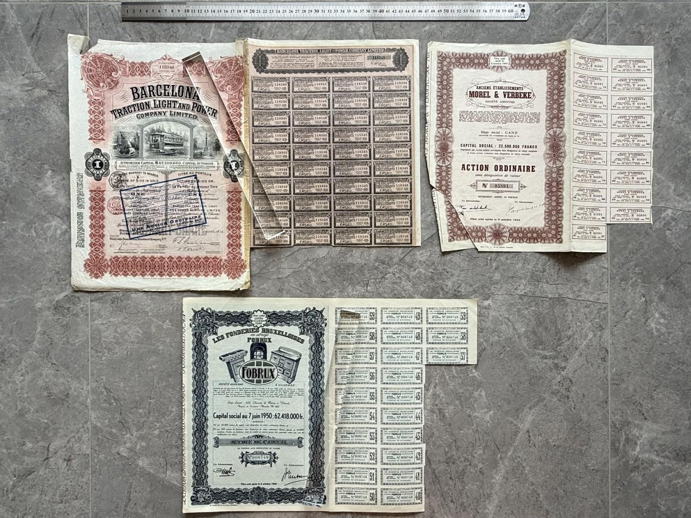 【乾奕收藏】出上世纪初欧洲国家企业股票债券12张，部分带分红息票，老股票实物难得，品相如图，老股票债券因材质保存环境等原因均存在不同程度的裂口，破损缺角，折角，虫蛀，老式贴补等瑕疵，请仔细看图认可品相再确认，发货免费提供纸筒邮寄。喜欢的老板不要错过，评级币一切以分数为准，售出非假不退