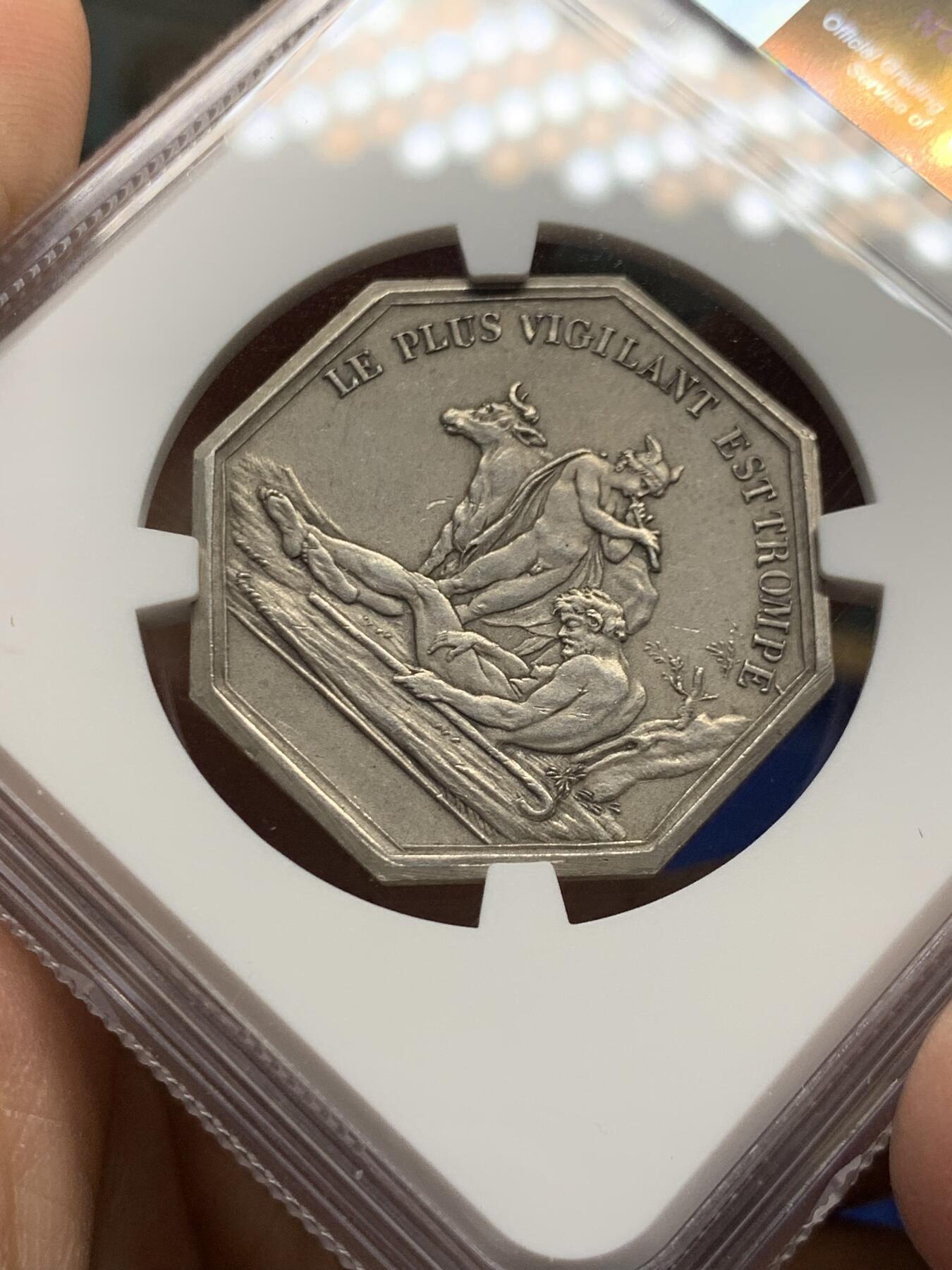 《竞宝斋》第473场 周日，周一 2场连拍 （全场包邮）欢迎送拍 NGC MS63 热门品种 双面神八角银章，丰饶角边铭，“再警惕的人也会受骗”