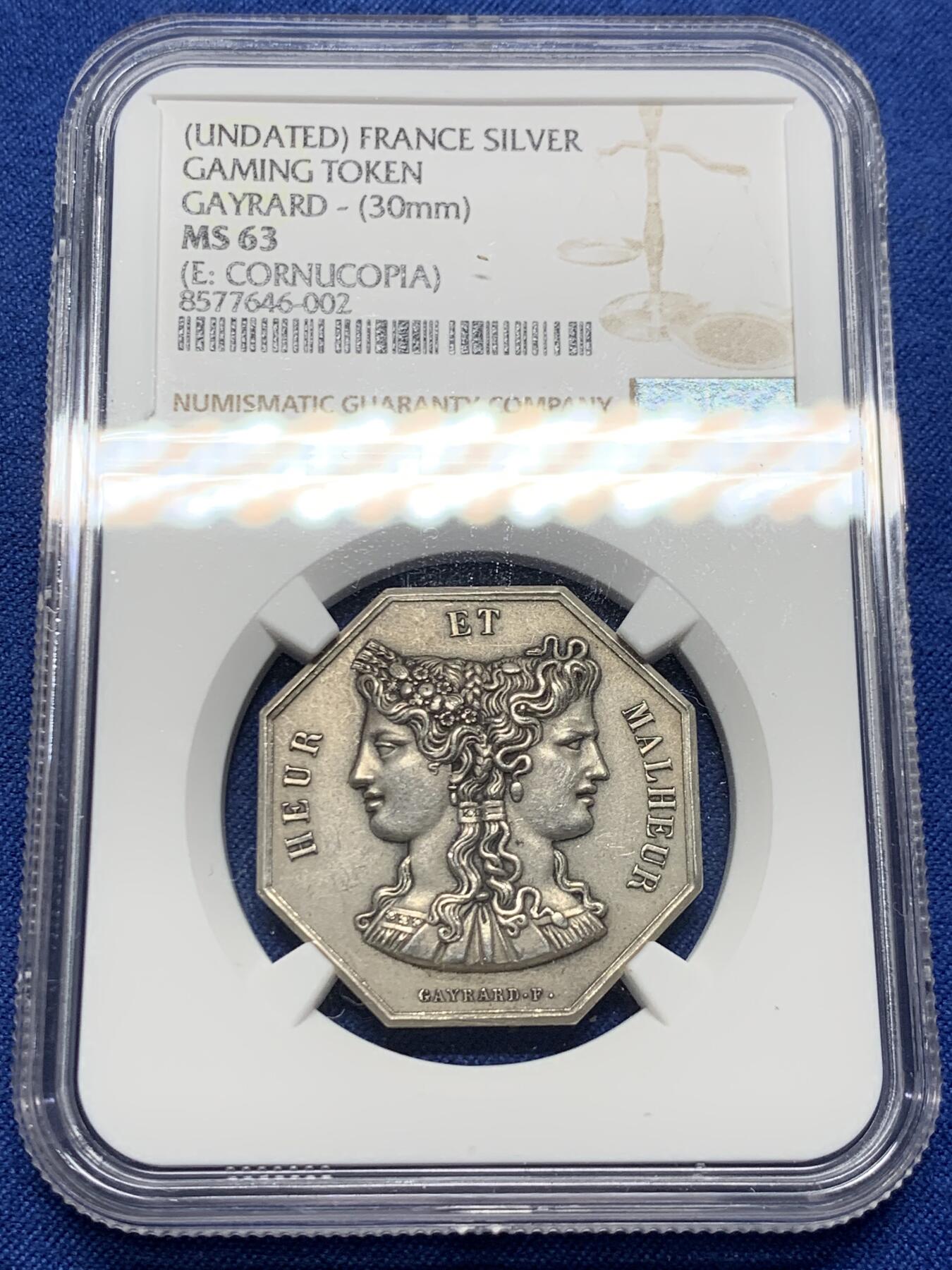 《竞宝斋》第473场 周日，周一 2场连拍 （全场包邮）欢迎送拍 NGC MS63 热门品种 双面神八角银章，丰饶角边铭，“再警惕的人也会受骗”