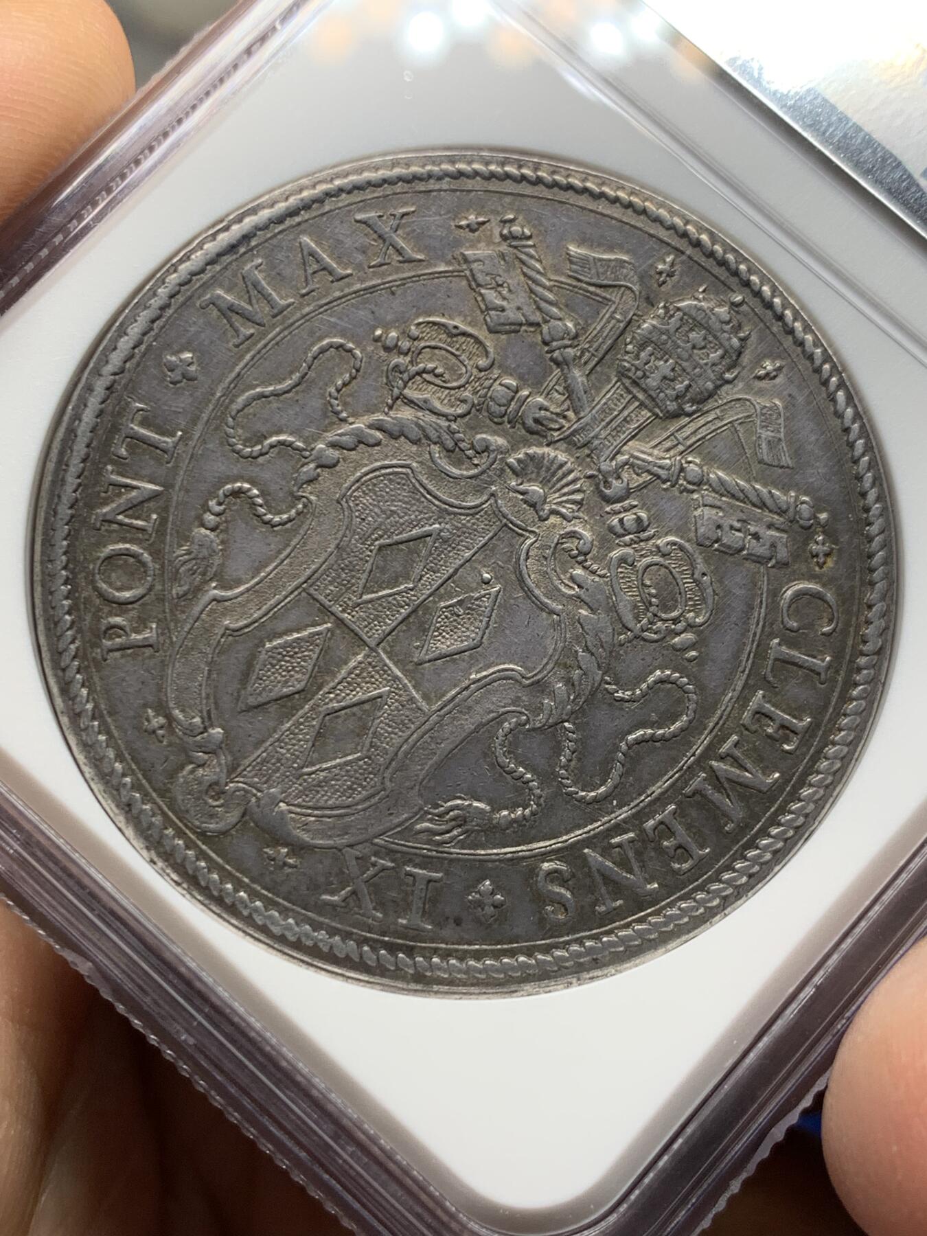 《竞宝斋》第473场 周日，周一 2场连拍 （全场包邮）欢迎送拍 唯一亚军分 NGC MS61 教皇国 1667-69 克莱门特九世 1P大银币 在位不足3年 对于这个教皇的币来说 每一枚都是不可多得的藏品 昆克AU品裸币3.6W成交