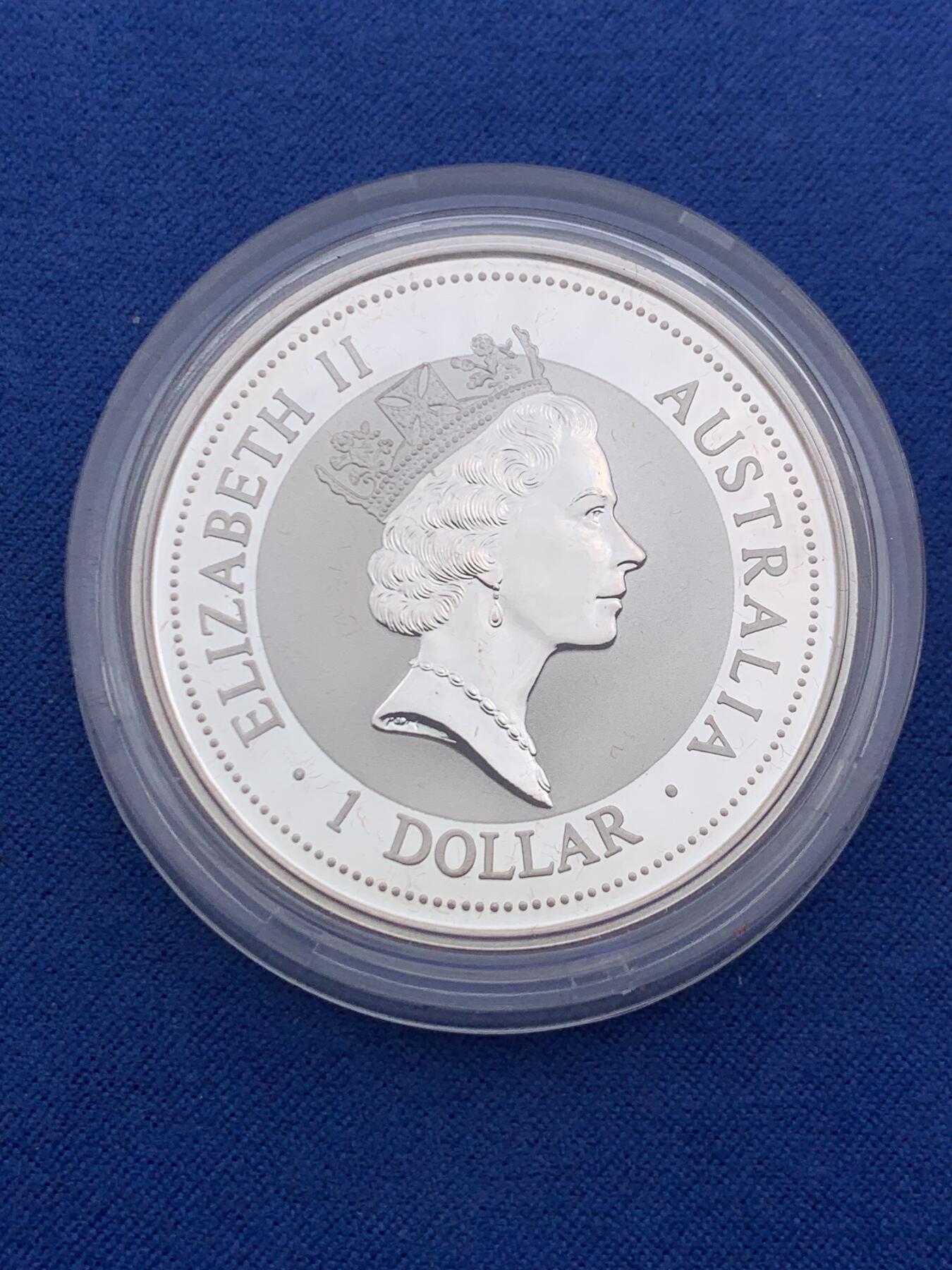 《竞宝斋》第473场 周日，周一 2场连拍 （全场包邮）欢迎送拍 澳大利亚 1997年 笑翠鸟 熊猫镶嵌银币 含纯银1盎司999银 镶嵌部分重约0.5克黄金