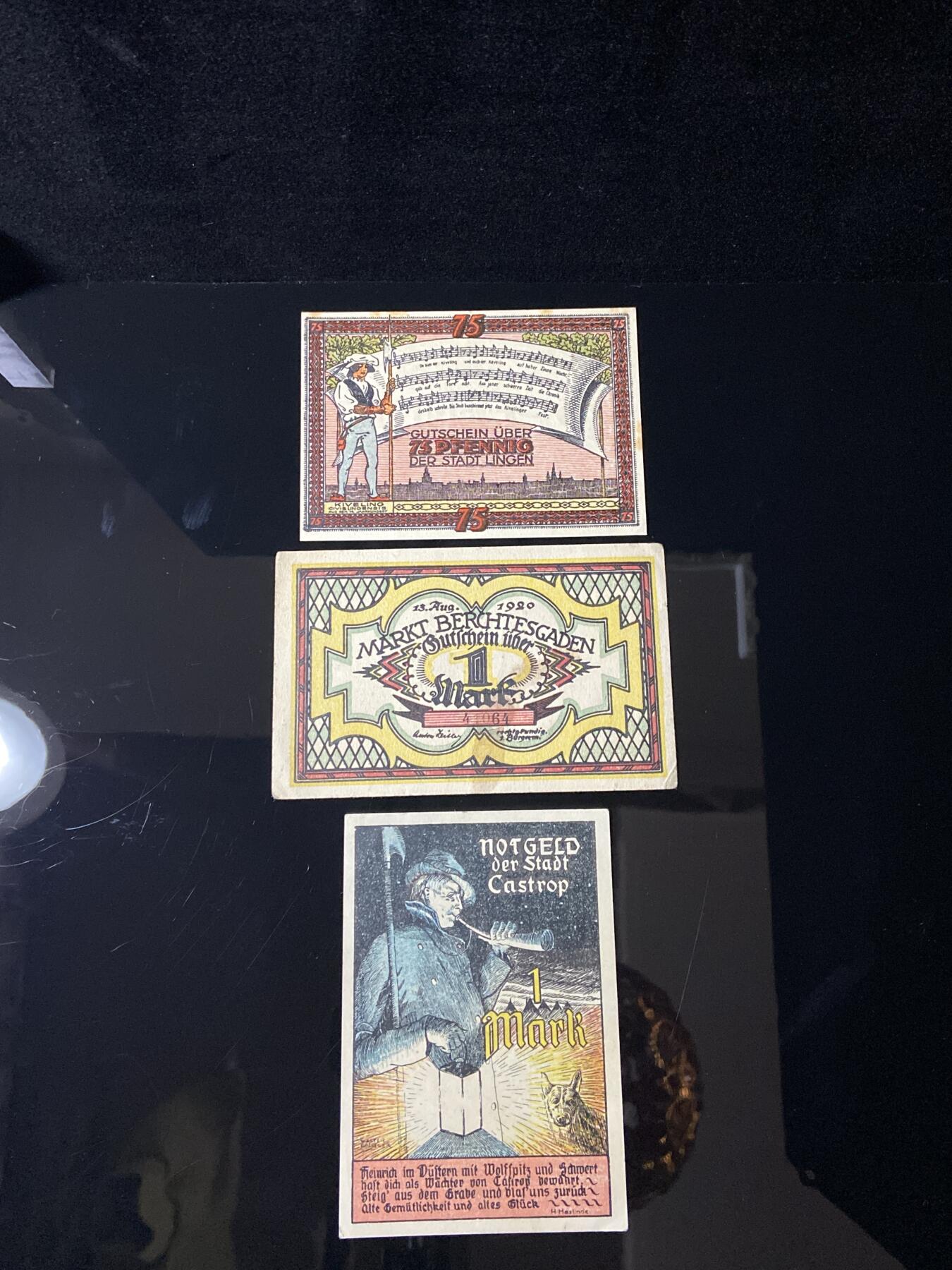 2026年第三十七场(总第二百零六场）德紧纸币特拍场(佣金3%，最低1元) 德紧纸币–第一行上 林根（Lingen） 水手/渔民形象+乐谱，林根市75芬尼，主题为当地海事文化与音乐，第二行中 贝希特斯加登（Berchtesgaden） 装饰性数字“1”+城市名，贝希特斯加登1马克紧急货币，阿尔卑斯山城主题，第三行下 卡斯特罗普（Castrop） 守夜人形象+吹号+犬只，卡斯特罗普1马克紧急货币，主题为中世纪守夜人文化