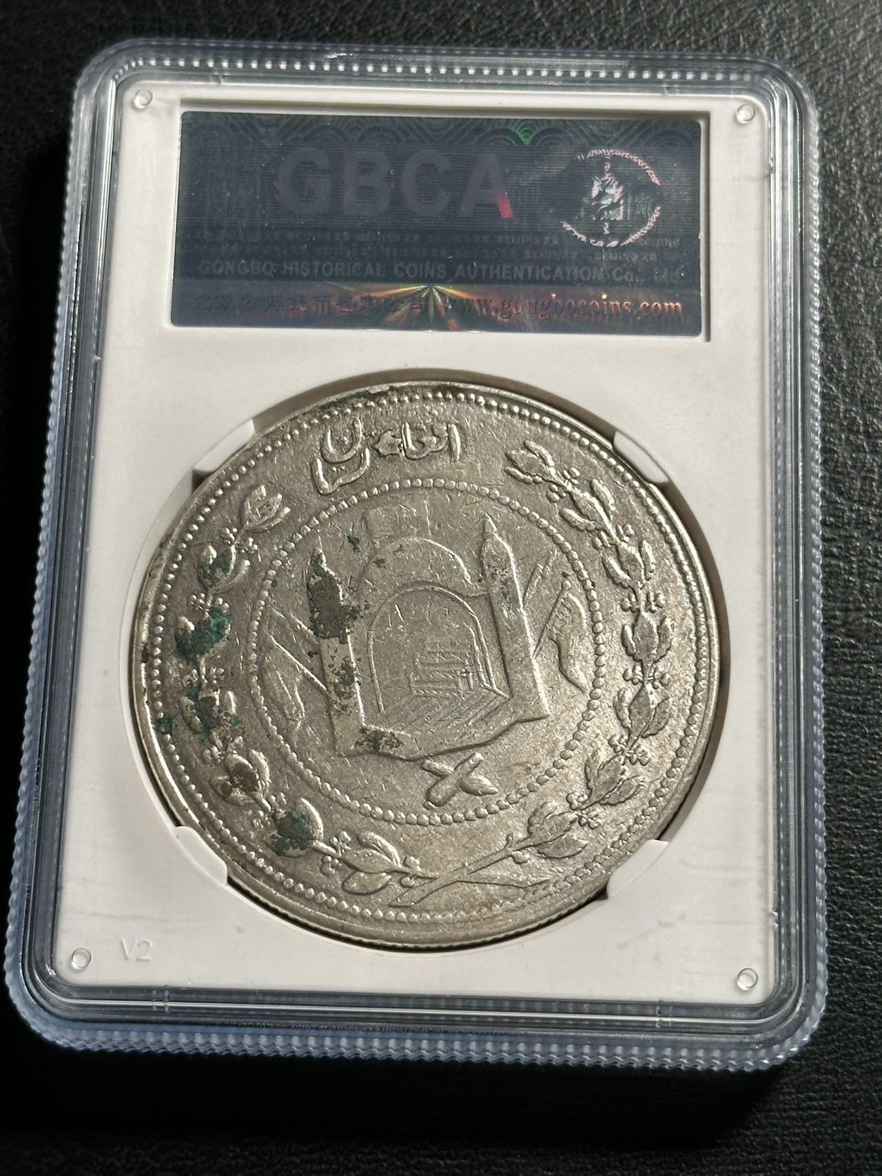 快速团购专场 公博XF，阿富汗AH1324（1906）年埃 米尔哈比卜拉•汗5R大银币，保真。币重46.0g，900银。因为铸造工艺，浅打。好品稀见，壳子尾号编号478。