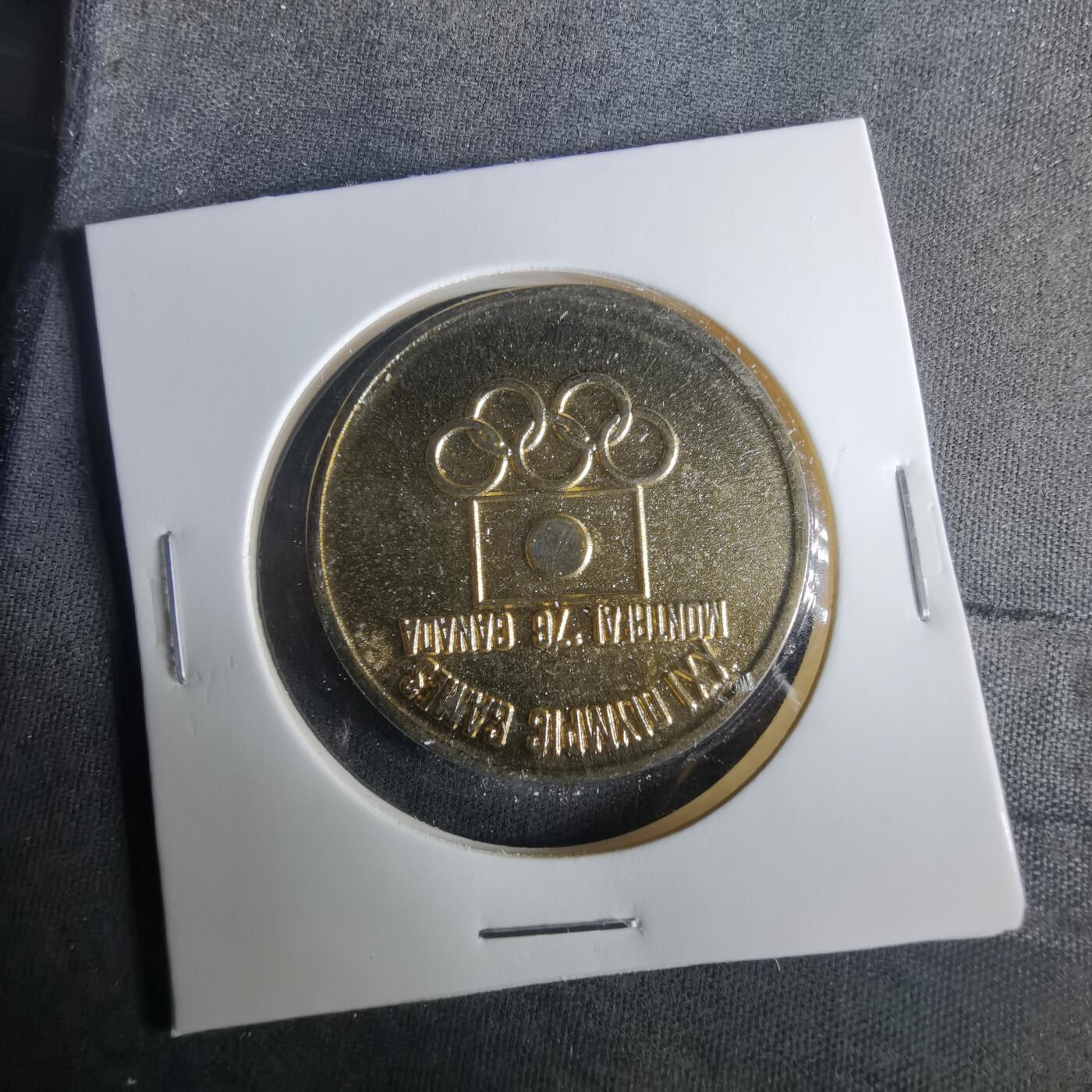 沼泽如烟--第1033场 奥运纪念章