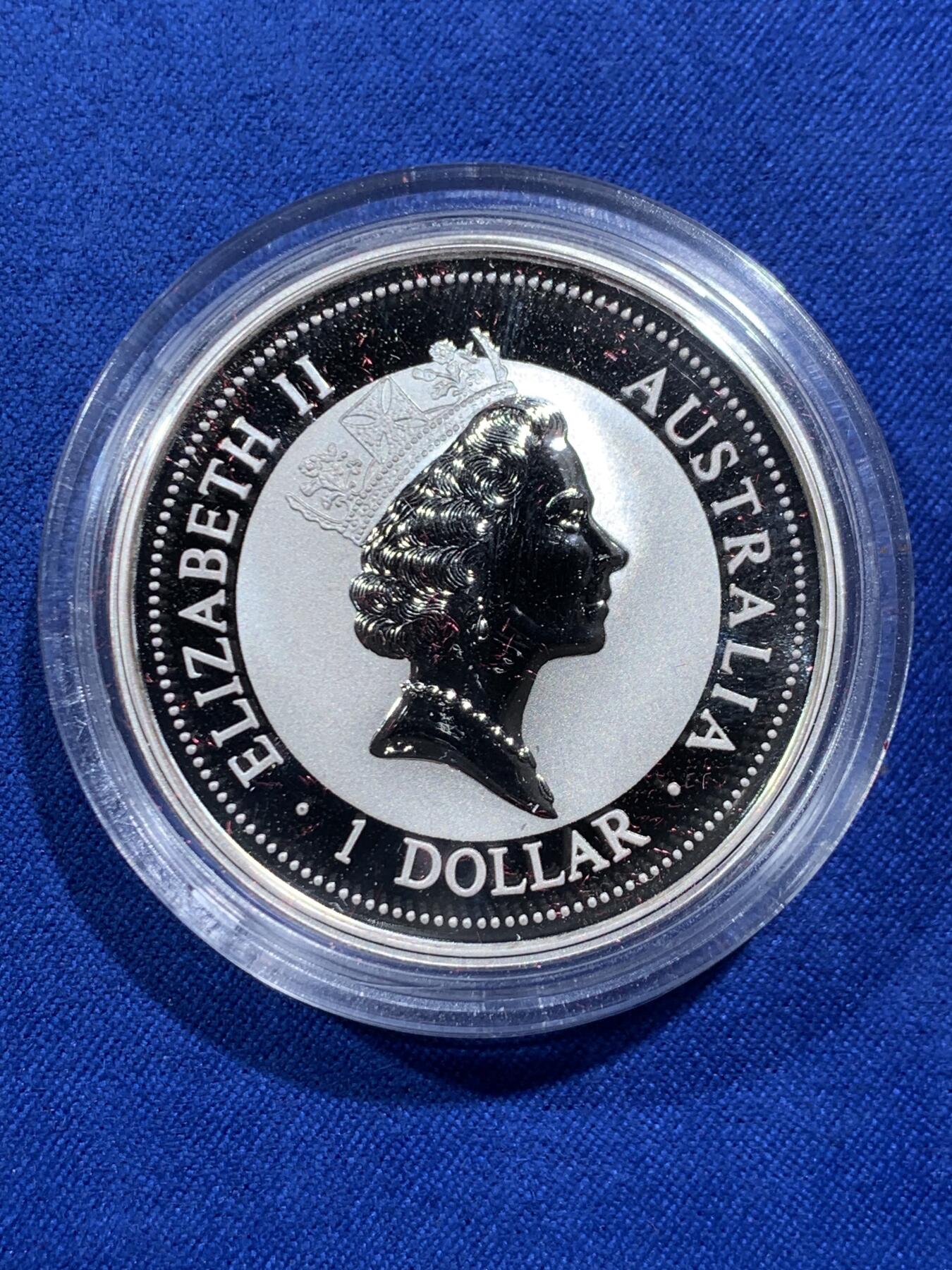 《竞宝斋》第473场 周日，周一 2场连拍 （全场包邮）欢迎送拍 澳大利亚 1997年 笑翠鸟 熊猫镶嵌银币 含纯银1盎司999银 镶嵌部分重约0.5克黄金