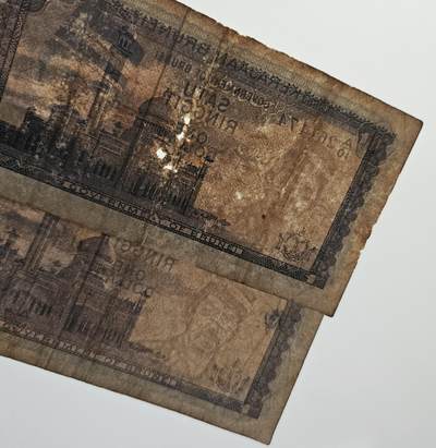 【币将精彩】纸币杂项拍卖（2026-4-27） 文莱1元纸币两枚旧票品如图 说明:外币旧票，均有折痕，污损，裂口，过水等瑕疵，品如图。