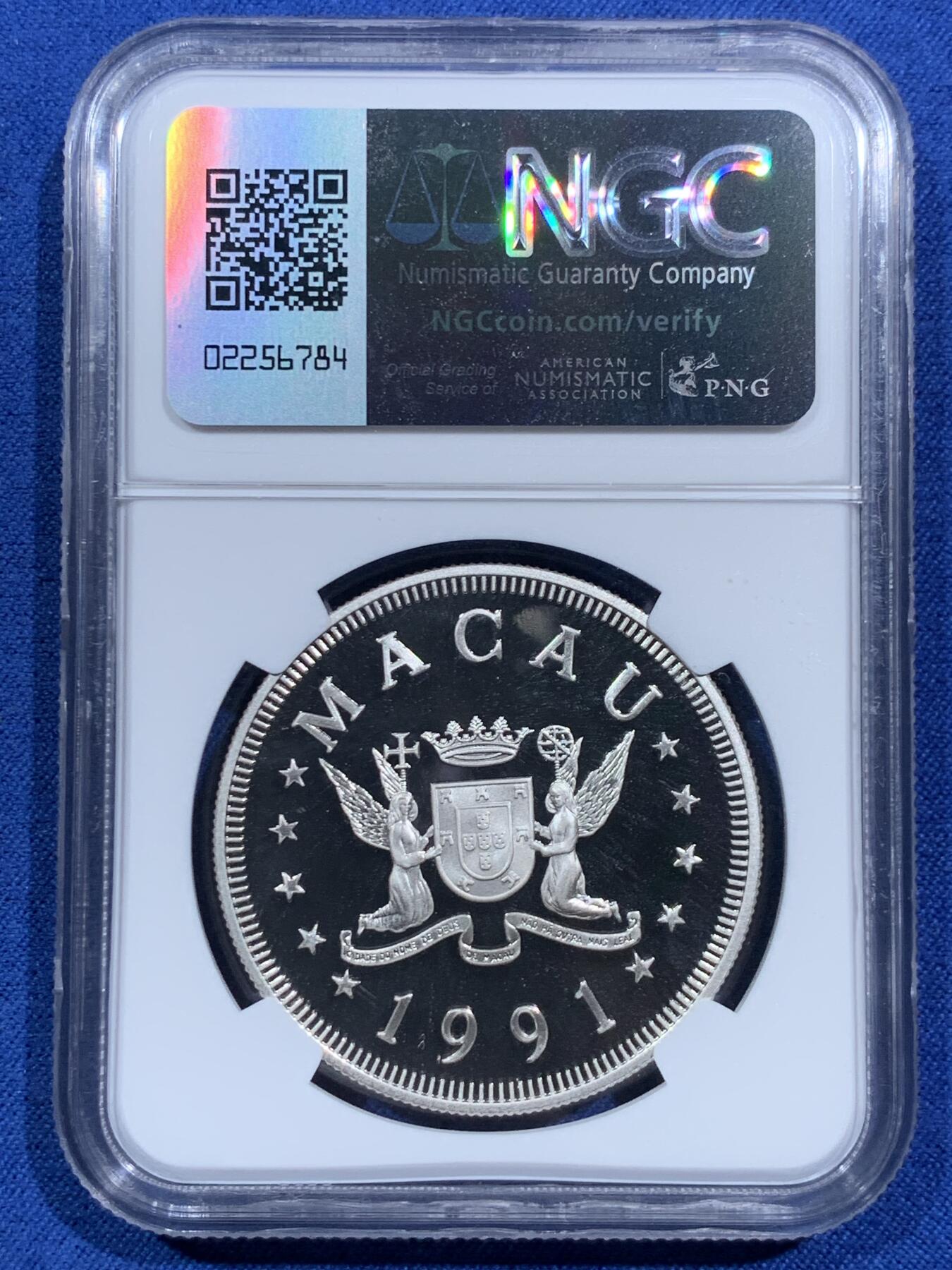 《竞宝斋》第473场 周日，周一 2场连拍 （全场包邮）欢迎送拍 NGC PF69UC 中国澳门1991年生肖羊年100元精制银币，直径38mm，重28.28g，925银，发行4000枚。PROOF精制币，币面清爽干净又舒适，状态一流。