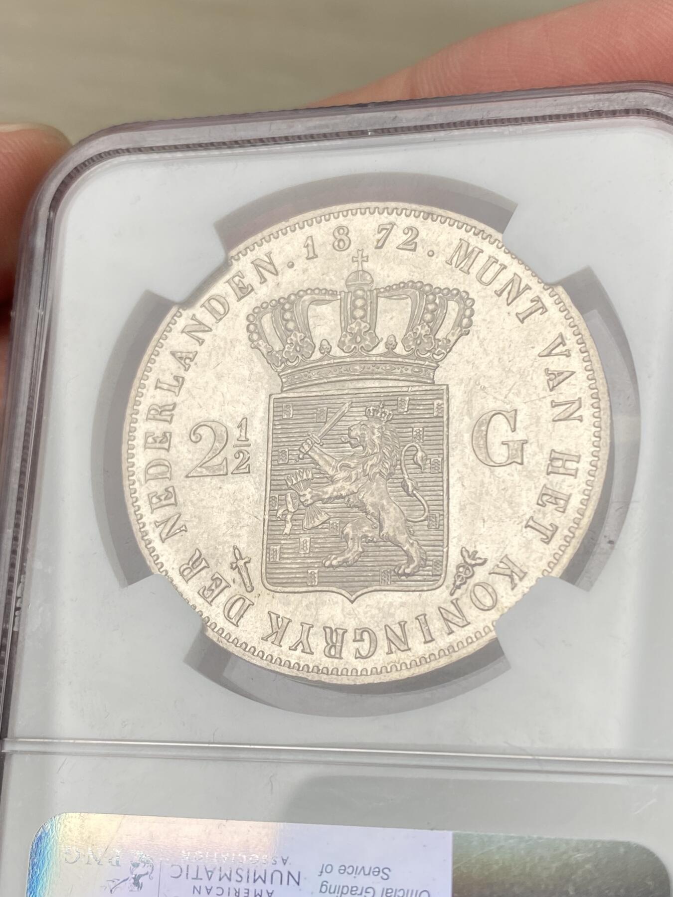 万国钱币拍卖第063期 NGC MS63 1872年荷兰王国威廉三世2.5盾大银 大量流通品种 好品难度不小 银霜转光收藏级
