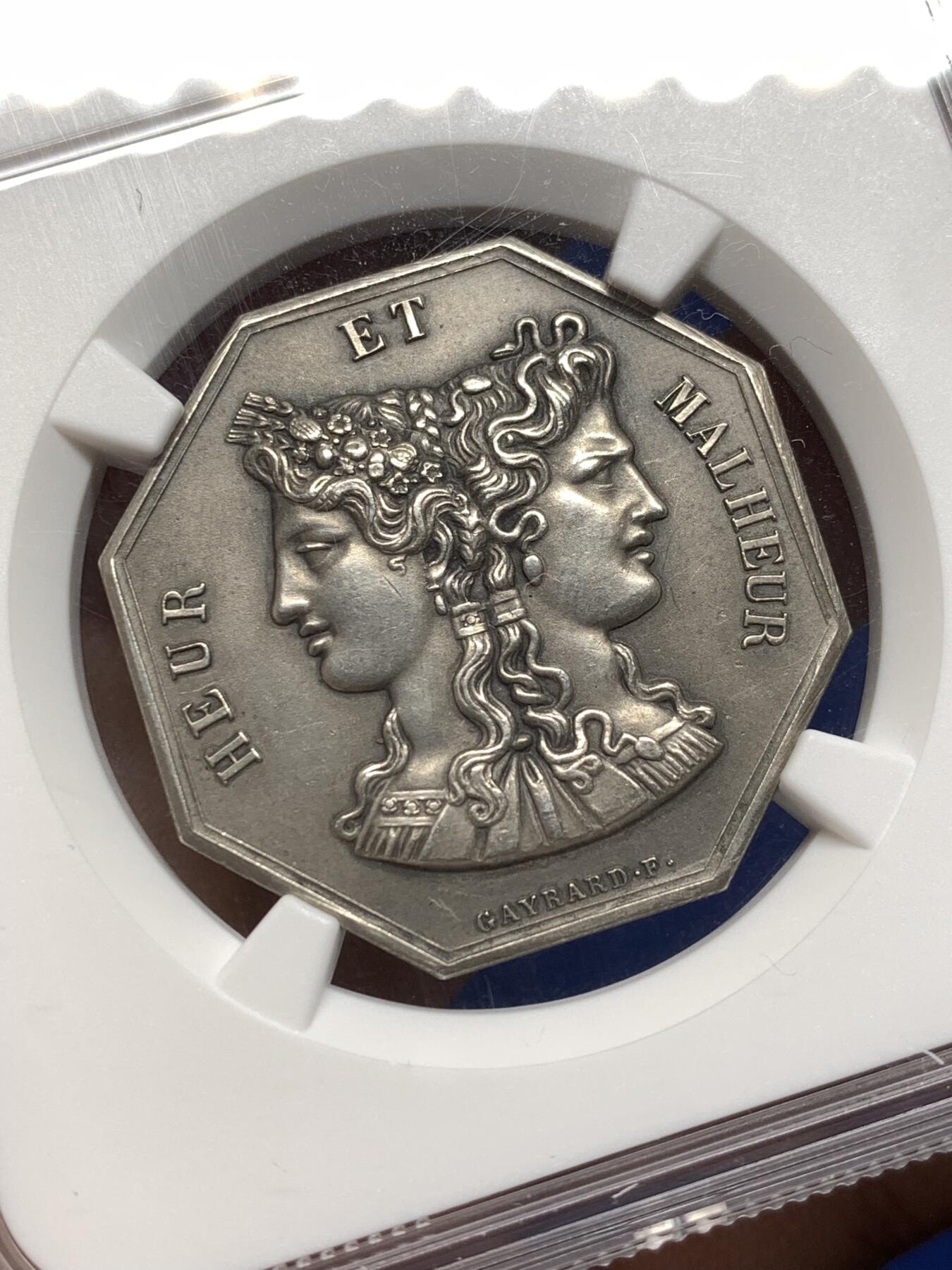 《竞宝斋》第474场 周日，周一 2场连拍 （全场包邮）欢迎送拍 NGC MS62 双面神八角银质代币，丰饶角边铭，“商业促进繁荣”，热门品种。