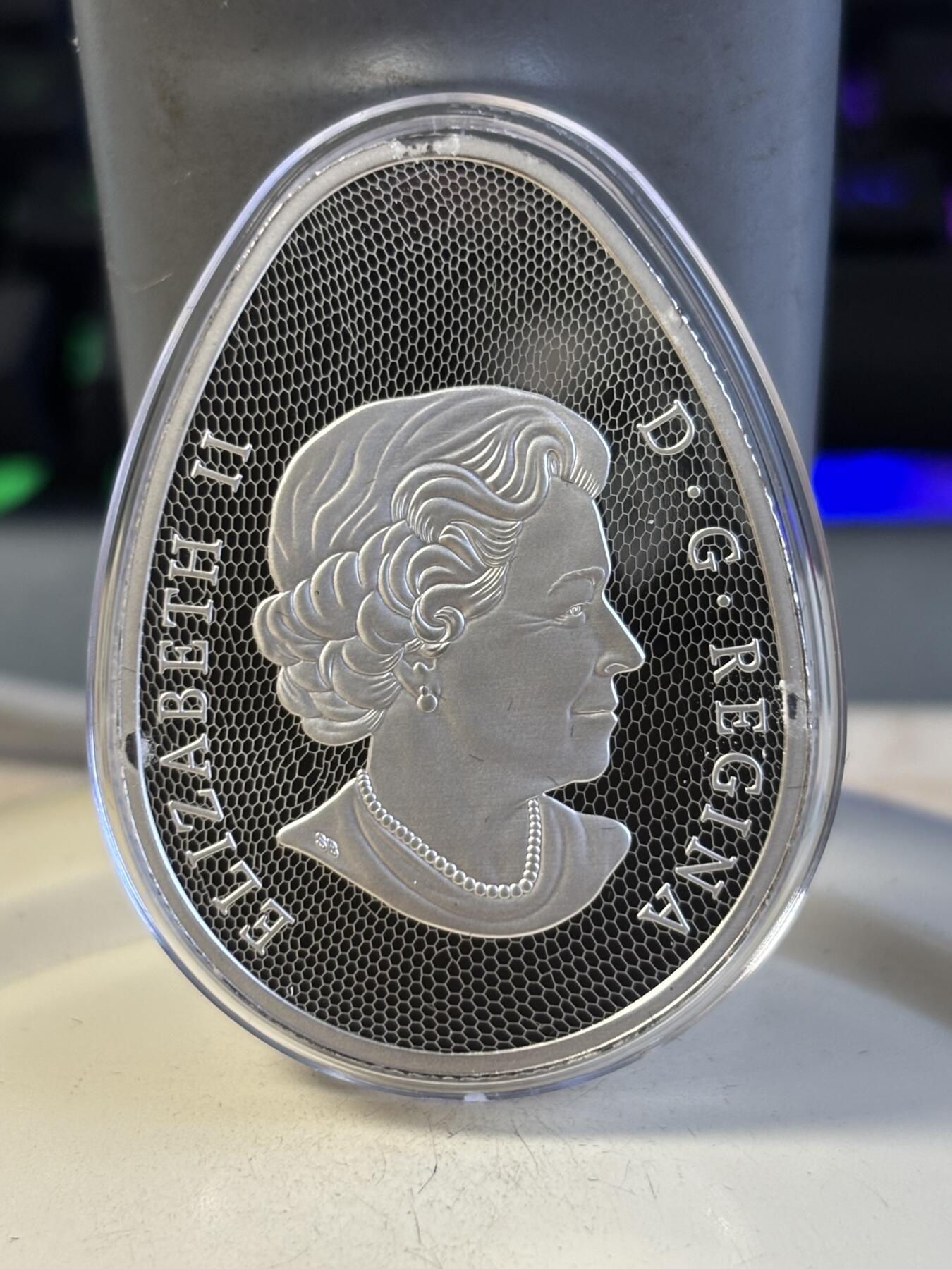 第195期拍卖 加拿大2019年恐龙蛋鸭嘴龙夜光1盎司纪念银币，9999银，发行4000枚