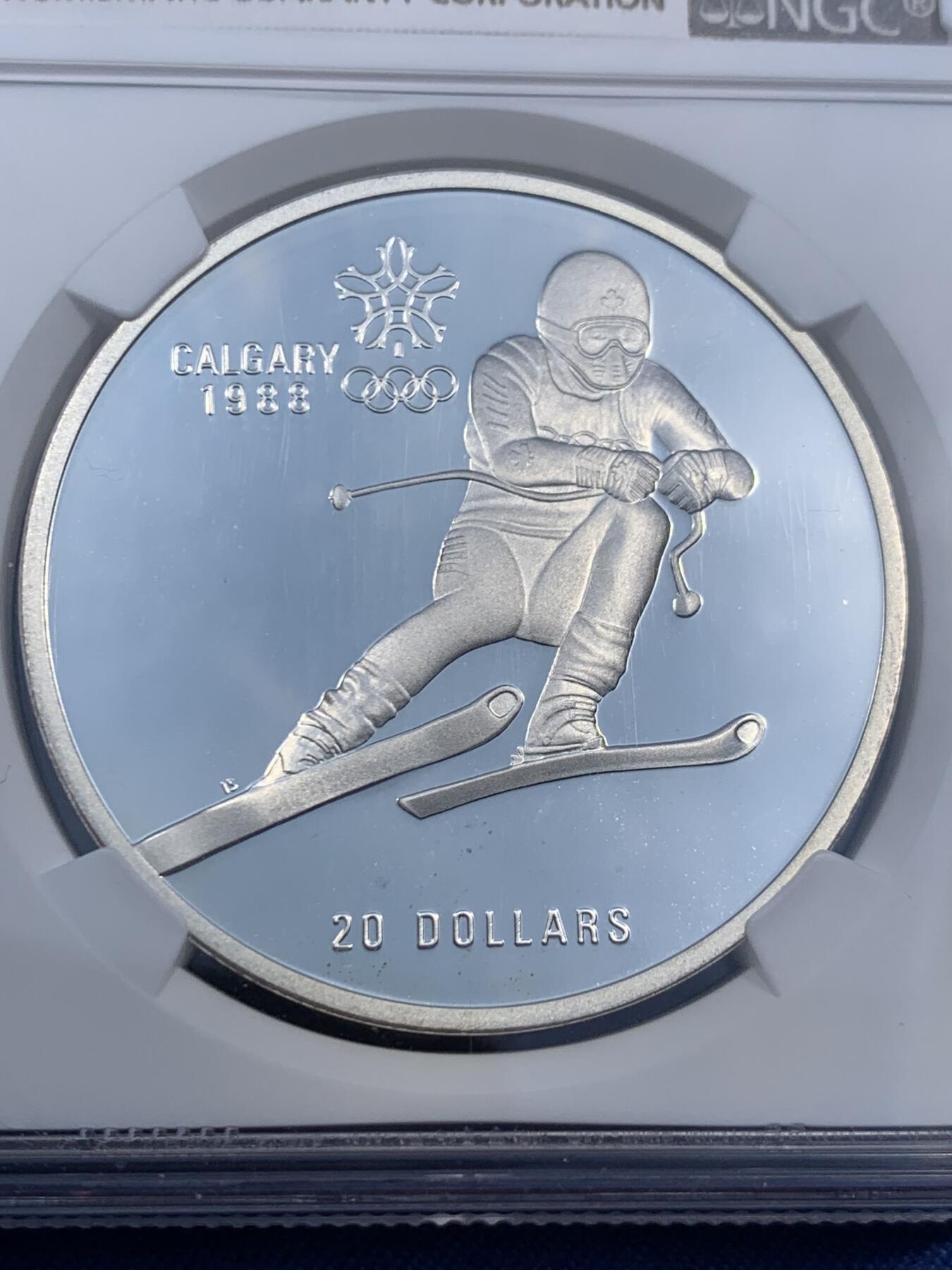 《竞宝斋》第474场 周日，周一 2场连拍 （全场包邮）欢迎送拍 NGC PF69UC 加拿大1985年卡尔加里冬奥会滑雪银币，克劳斯获奖币