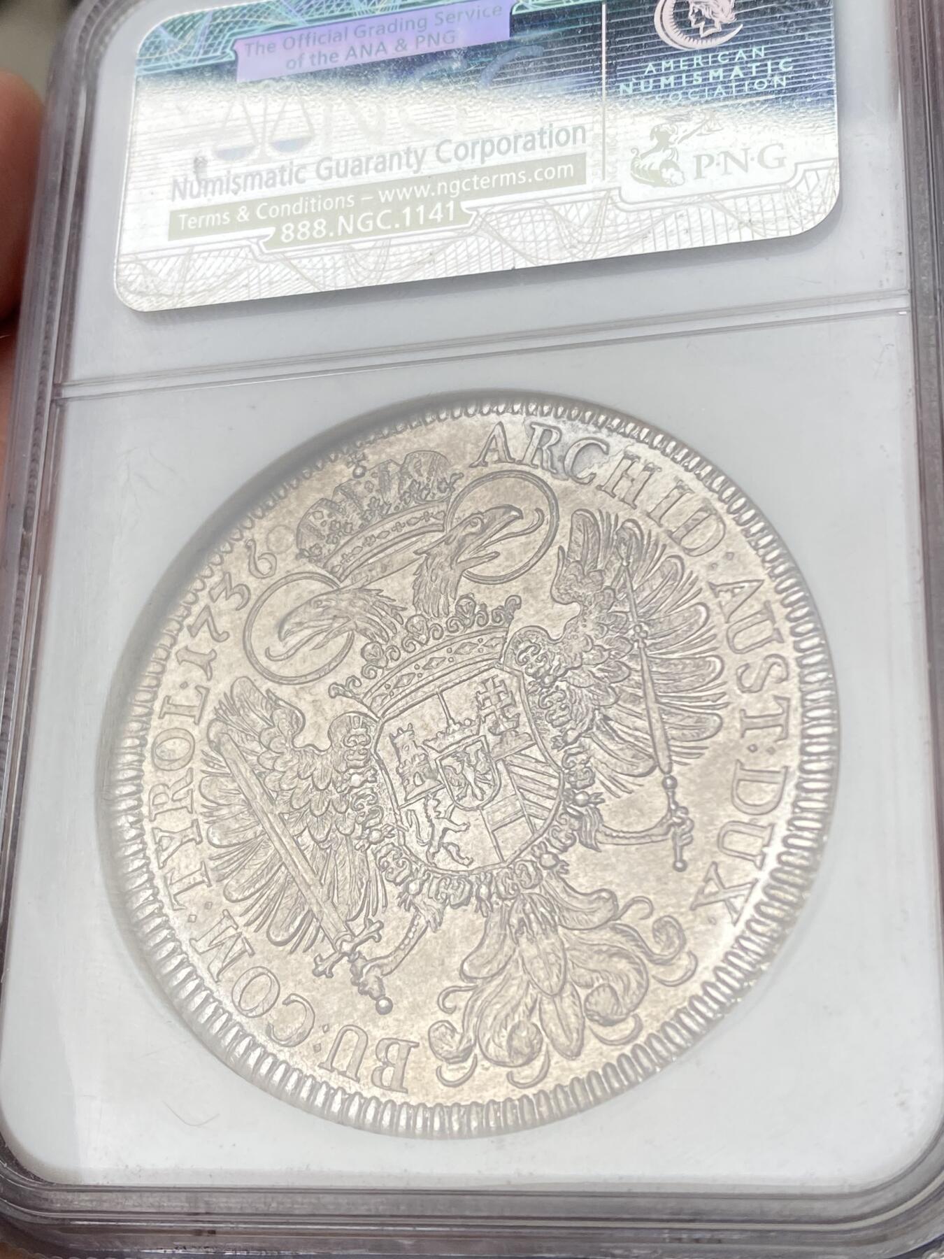 万国钱币拍卖第063期 NGC MS62 1736年神圣罗马帝国皇帝卡尔六世双头鹰大泰勒 哈尔厂铸造 神罗经典品种全深打淡彩环绕 NGC老盒收藏级