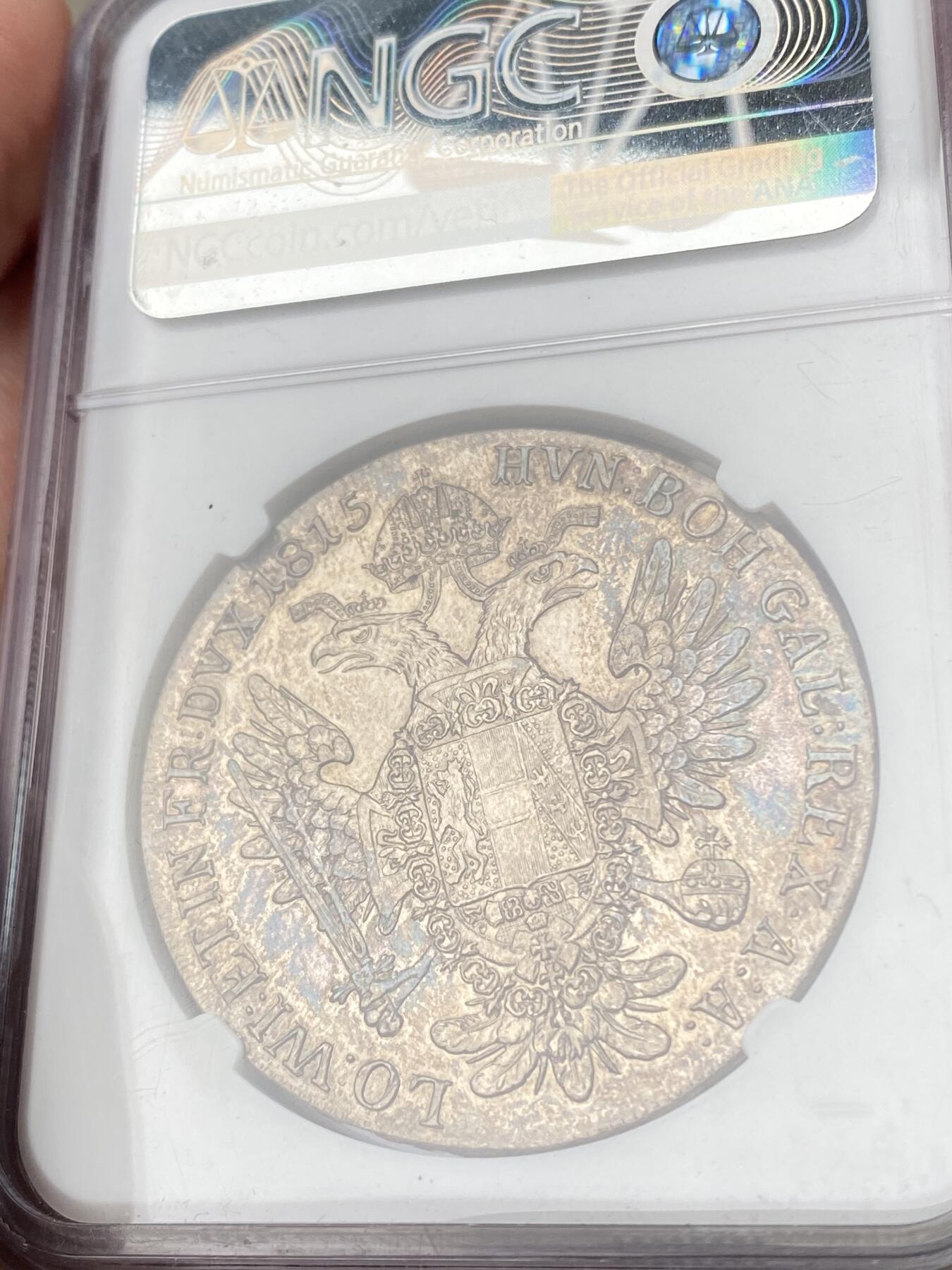 万国钱币拍卖第063期 NGC MS61 1815年奥地利帝国弗朗茨一世双头鹰大泰勒 熟美欧陆酱五彩包浆环绕打制极佳收藏级品质