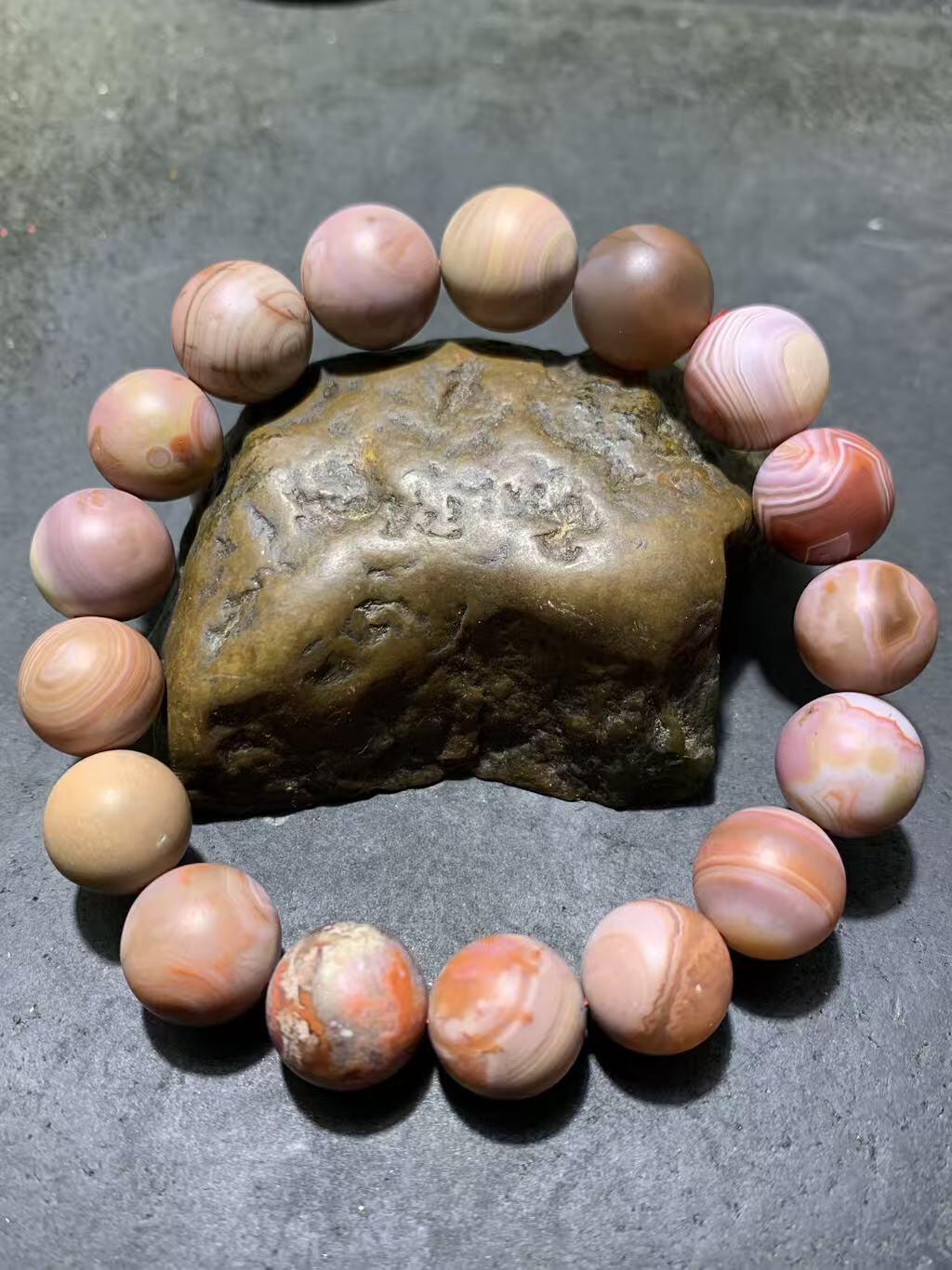 川料南红玛瑙包浆料手串一条，