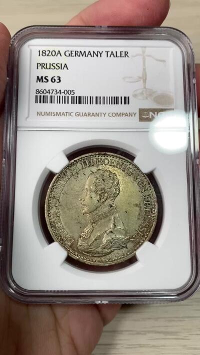 万国钱币拍卖第063期 NGC MS63 1820年德国普鲁士威廉三世鹰炮泰勒 普鲁士大名誉品种 原味欧陆淡金彩环绕无减重痕迹 全深打高点堪称完美 实在是不可多得的顶级收藏品质 NGC唯二冠军分