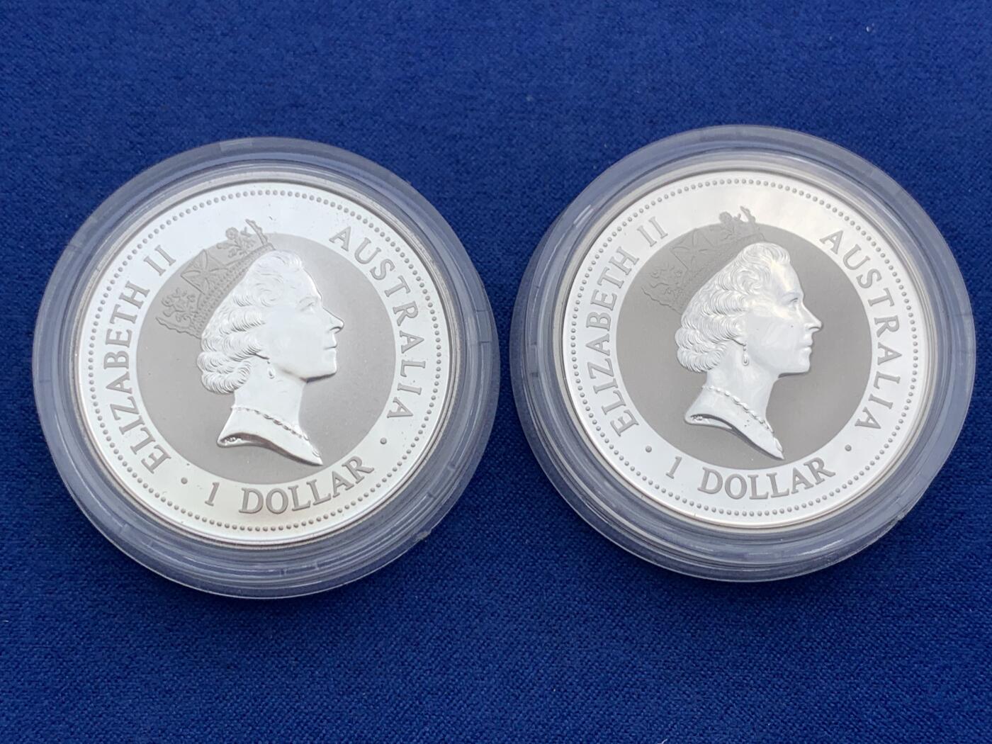 《竞宝斋》第474场 周日，周一 2场连拍 （全场包邮）欢迎送拍 两枚一组 澳大利亚 1997年 笑翠鸟 金龙/金凤镶嵌银币 每枚含纯银1盎司999银（镶嵌部分重约0.5克黄金）