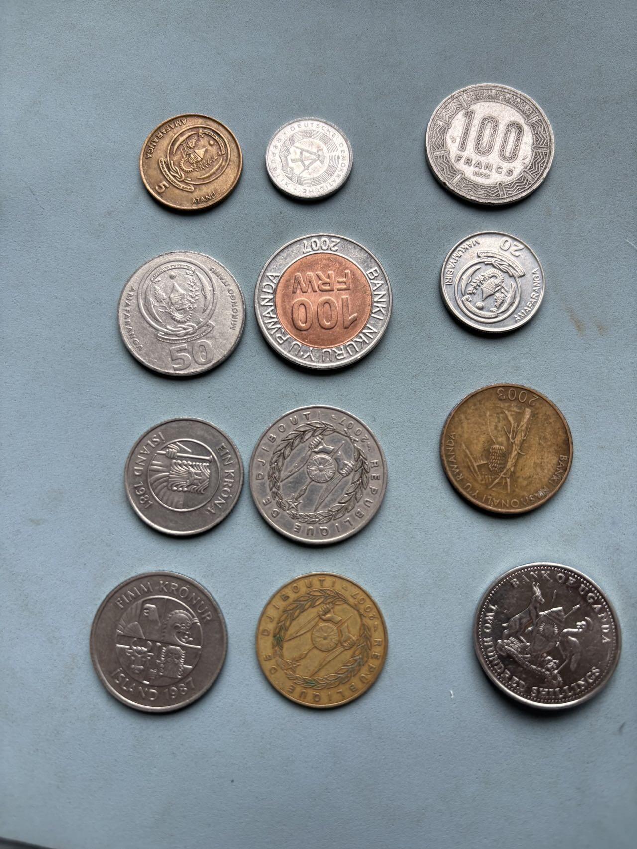 盛世勋华——号角文化勋章邮票专场拍卖第310期 非洲、欧洲多国流通硬币一组12枚，涵盖东德、冰岛、卢旺达、乌干达、安哥拉、吉布提、喀麦隆、科摩罗等国家