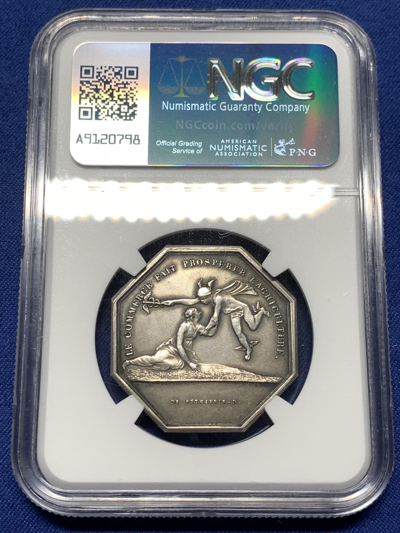 《竞宝斋》第474场 周日，周一 2场连拍 （全场包邮）欢迎送拍 NGC MS62 双面神八角银质代币，丰饶角边铭，“商业促进繁荣”，热门品种。