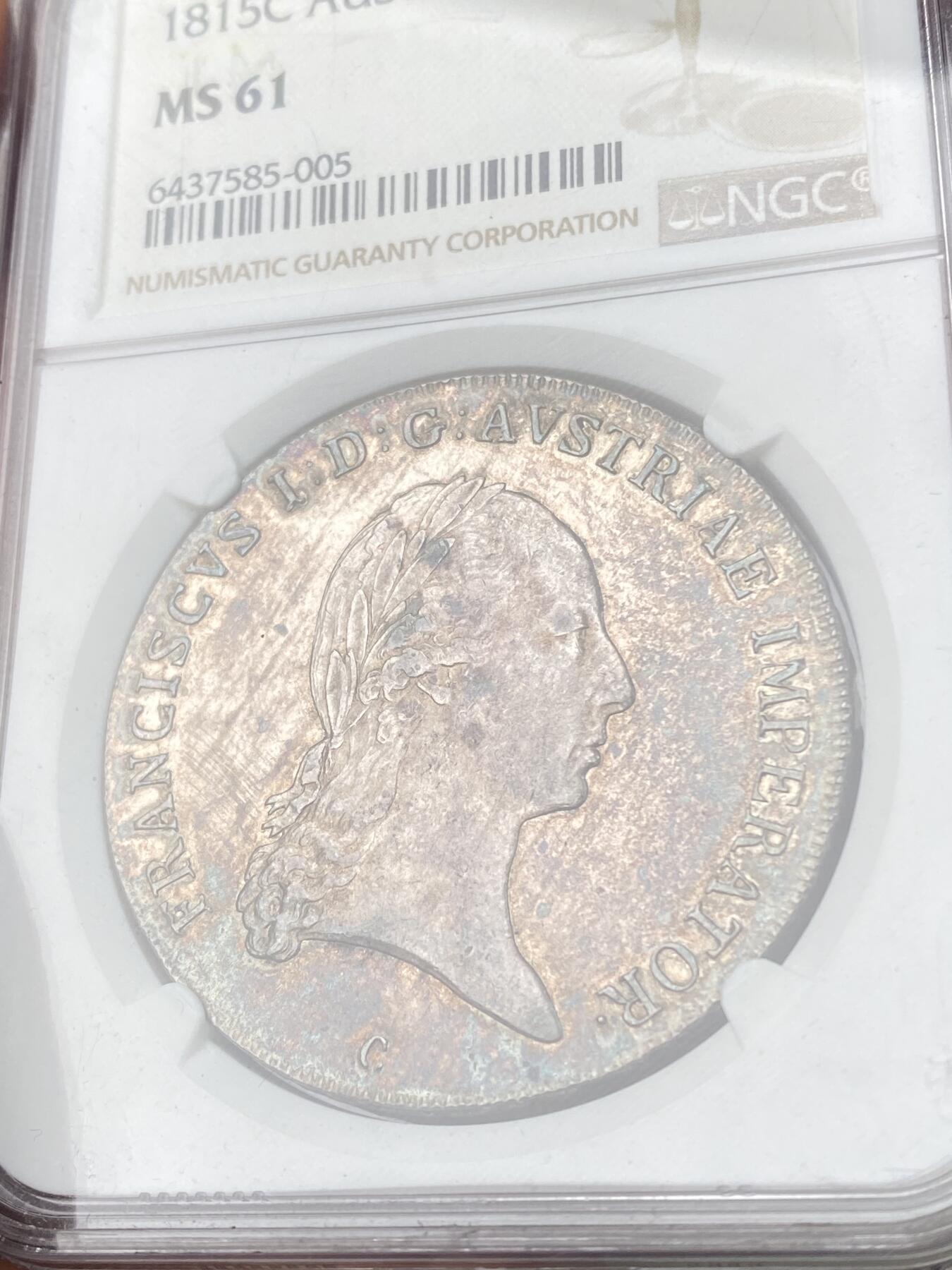 万国钱币拍卖第063期 NGC MS61 1815年奥地利帝国弗朗茨一世双头鹰大泰勒 熟美欧陆酱五彩包浆环绕打制极佳收藏级品质