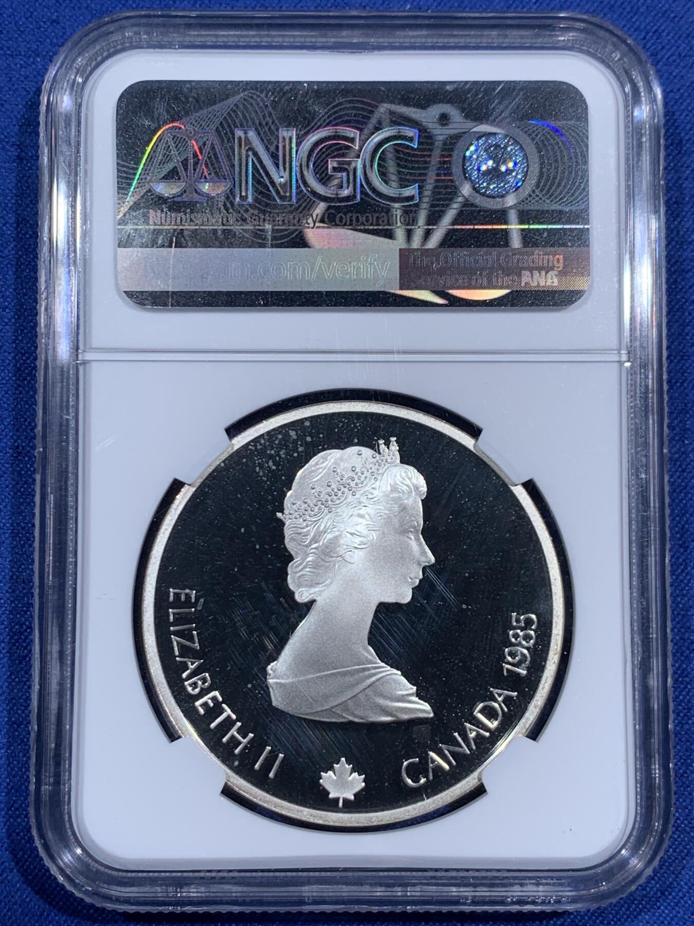 《竞宝斋》第474场 周日，周一 2场连拍 （全场包邮）欢迎送拍 NGC PF69UC 加拿大1985年卡尔加里冬奥会滑雪银币，克劳斯获奖币