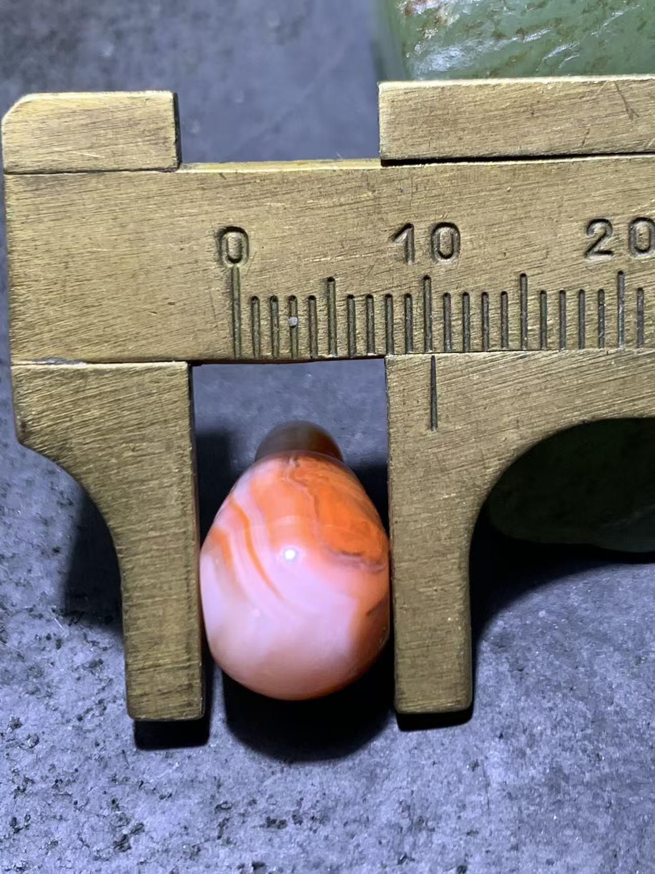 精美川料冰飘柿子红南红玛瑙一体佛头三通一个