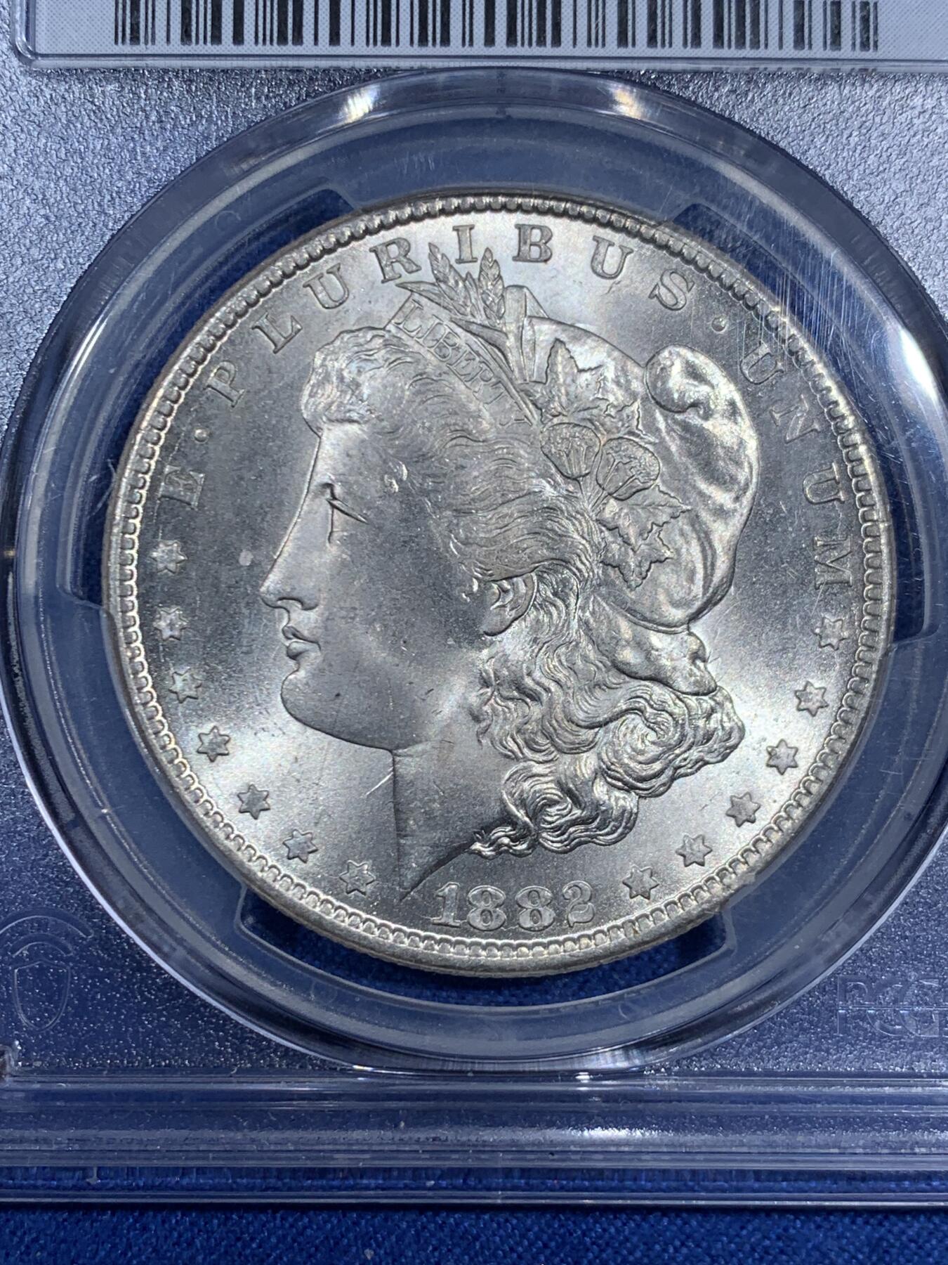 《竞宝斋》第474场 周日，周一 2场连拍 （全场包邮）欢迎送拍 PCGS MS66 美国 1882 CC 摩根银币 稀有卡森厂 麦稀奇所见最高分 转光犀利 打制极美 银霜感十足 不可错过的极佳收藏品 一枚毕业