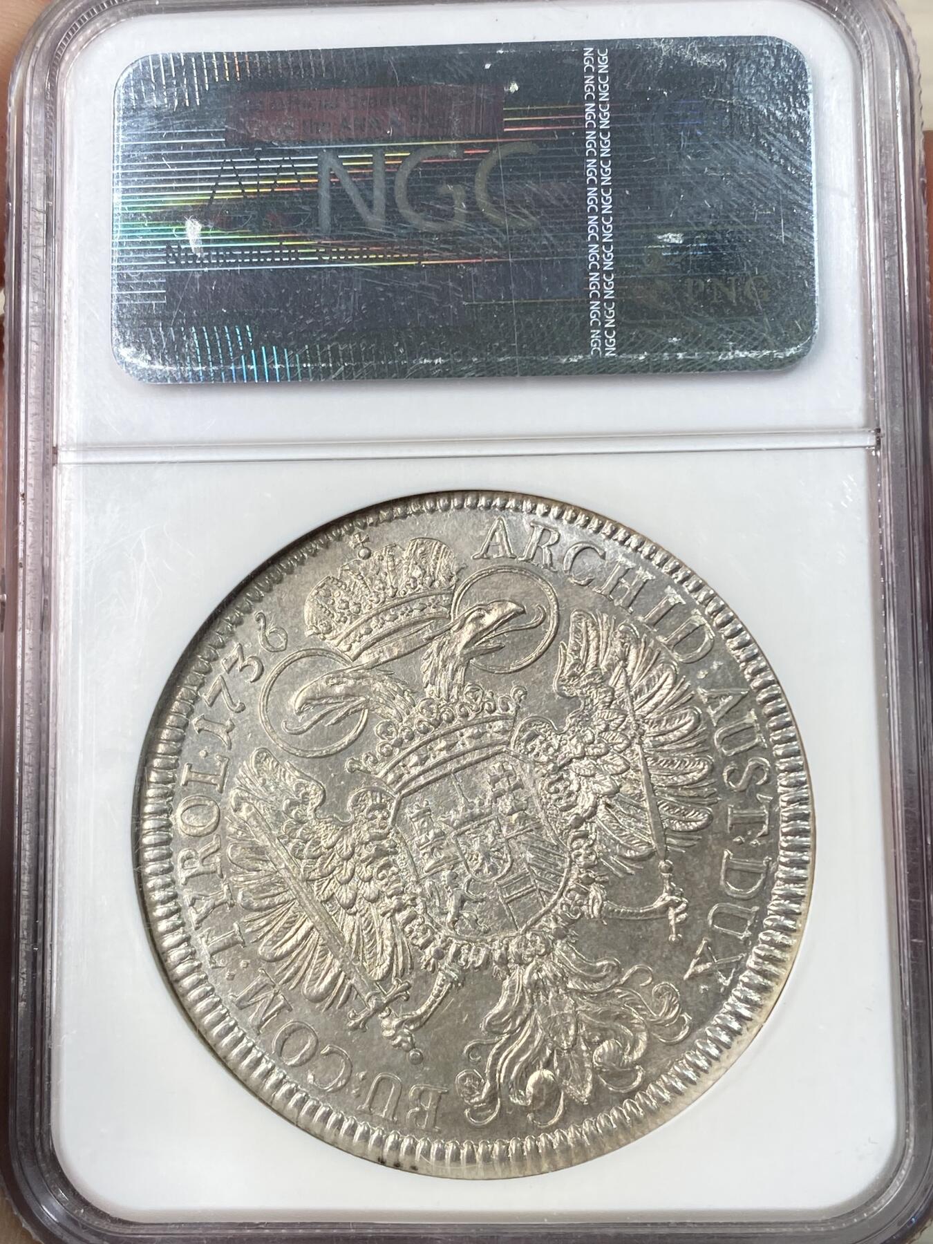 万国钱币拍卖第063期 NGC MS62 1736年神圣罗马帝国皇帝卡尔六世双头鹰大泰勒 哈尔厂铸造 神罗经典品种全深打淡彩环绕 NGC老盒收藏级