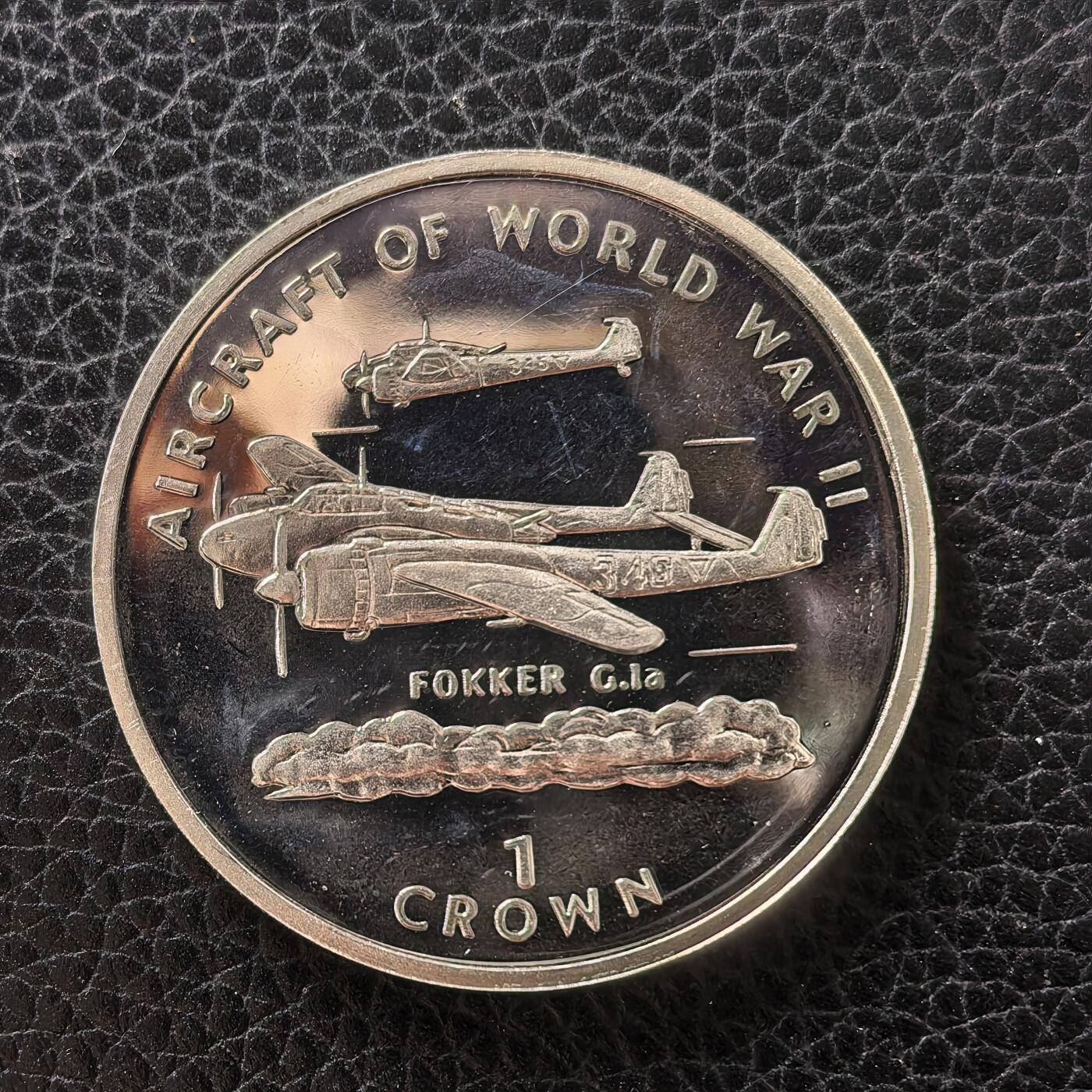 道一币馆币章第一百七十二场 马恩岛1995年反法西斯胜利50周年-荷兰福克G.1a战斗机1克朗银币 28.28g 925s