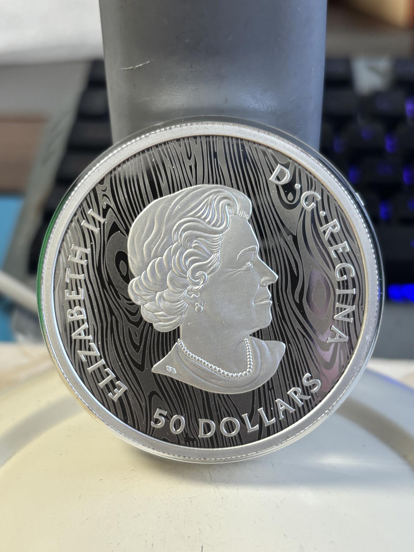 第195期拍卖 加拿大2021年美洲狮多层雕刻立体镂空105.6克银币，9999银，105.6克，发行1500枚