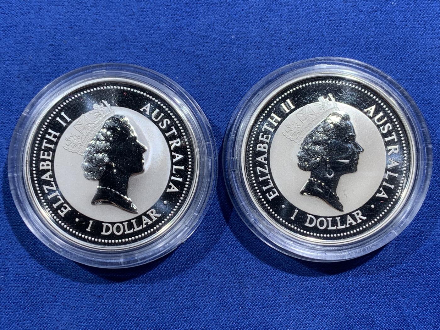 《竞宝斋》第474场 周日，周一 2场连拍 （全场包邮）欢迎送拍 两枚一组 澳大利亚 1997年 笑翠鸟 金龙/金凤镶嵌银币 每枚含纯银1盎司999银（镶嵌部分重约0.5克黄金）